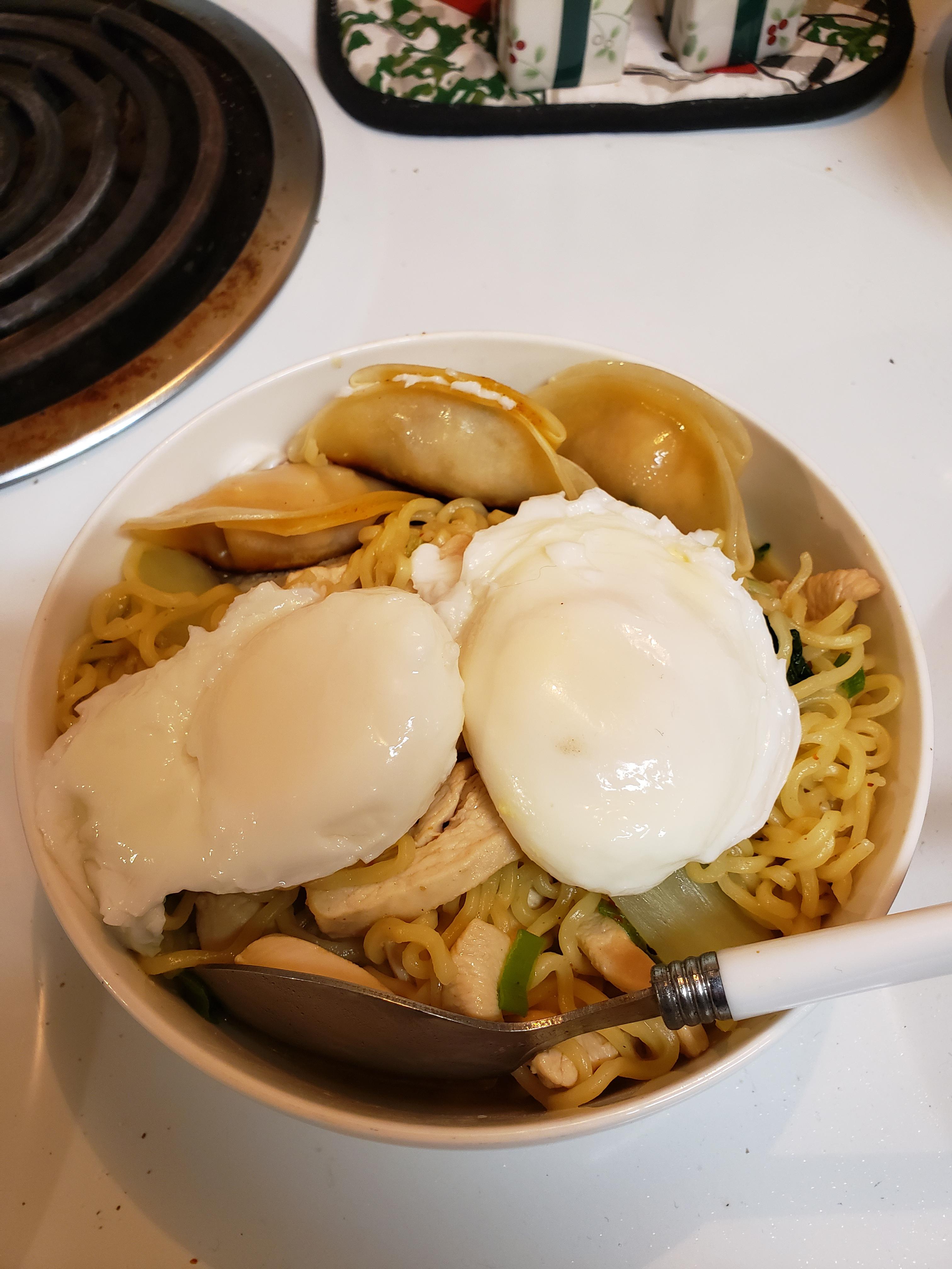 Chicken Curry Ramen with potstickers on the side and two poachy bois