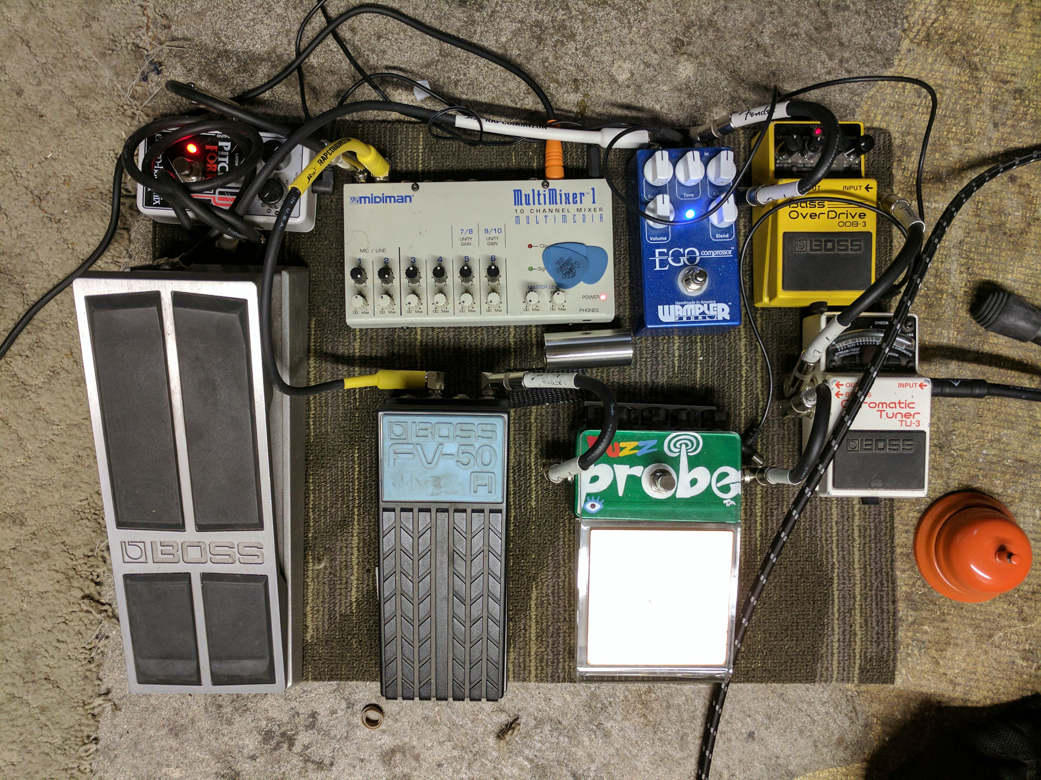 Two channel pedal board using tuner to split the signal and small mixer