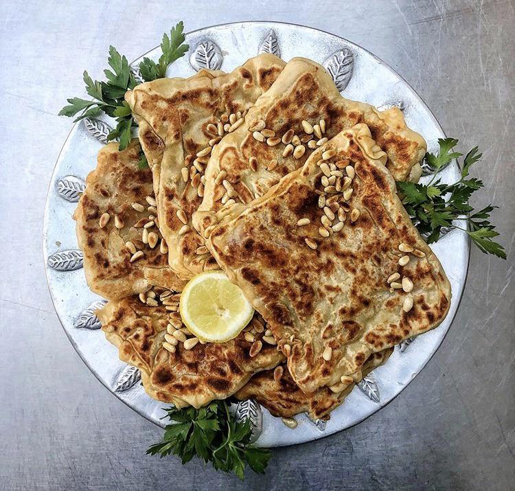 [homemade] tasty North African bread filled with confit tomatoes and