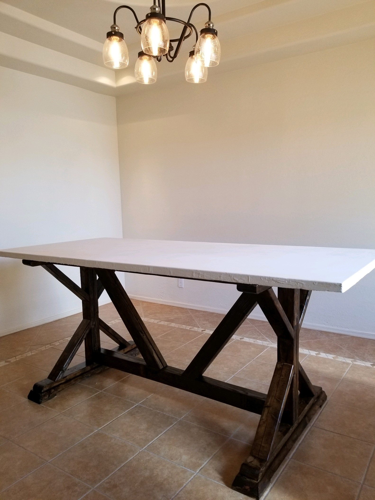 Beautiful White Concrete Table Top With Construction Lumber Base