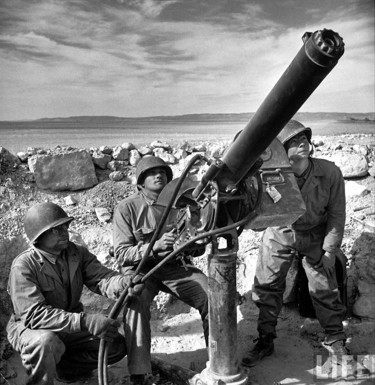 American Army Air Force fighter command soldiers manning .50 cal water