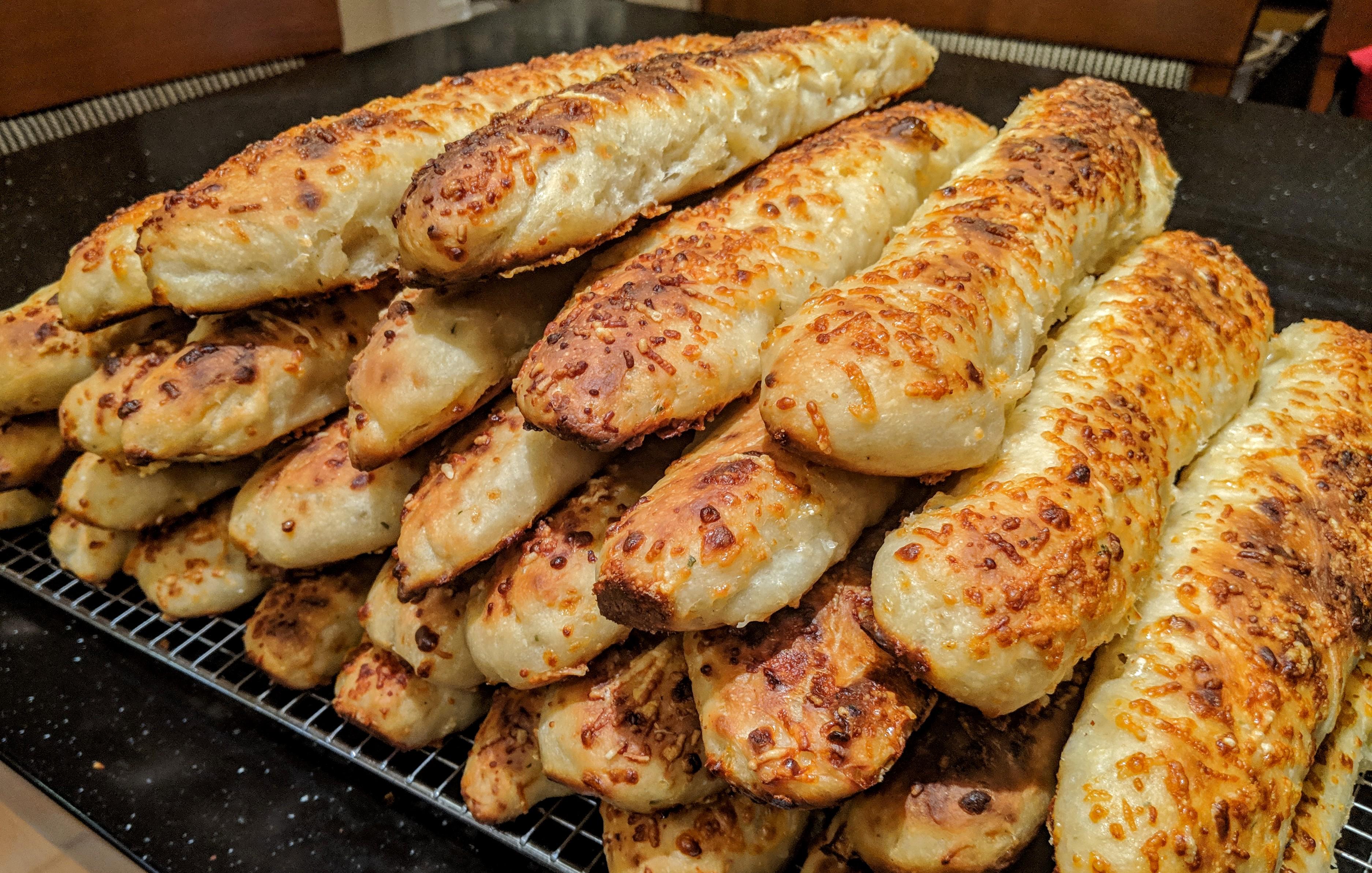 Cheesy breadsticks. Parmesan on the outside, and gruyere in the dough