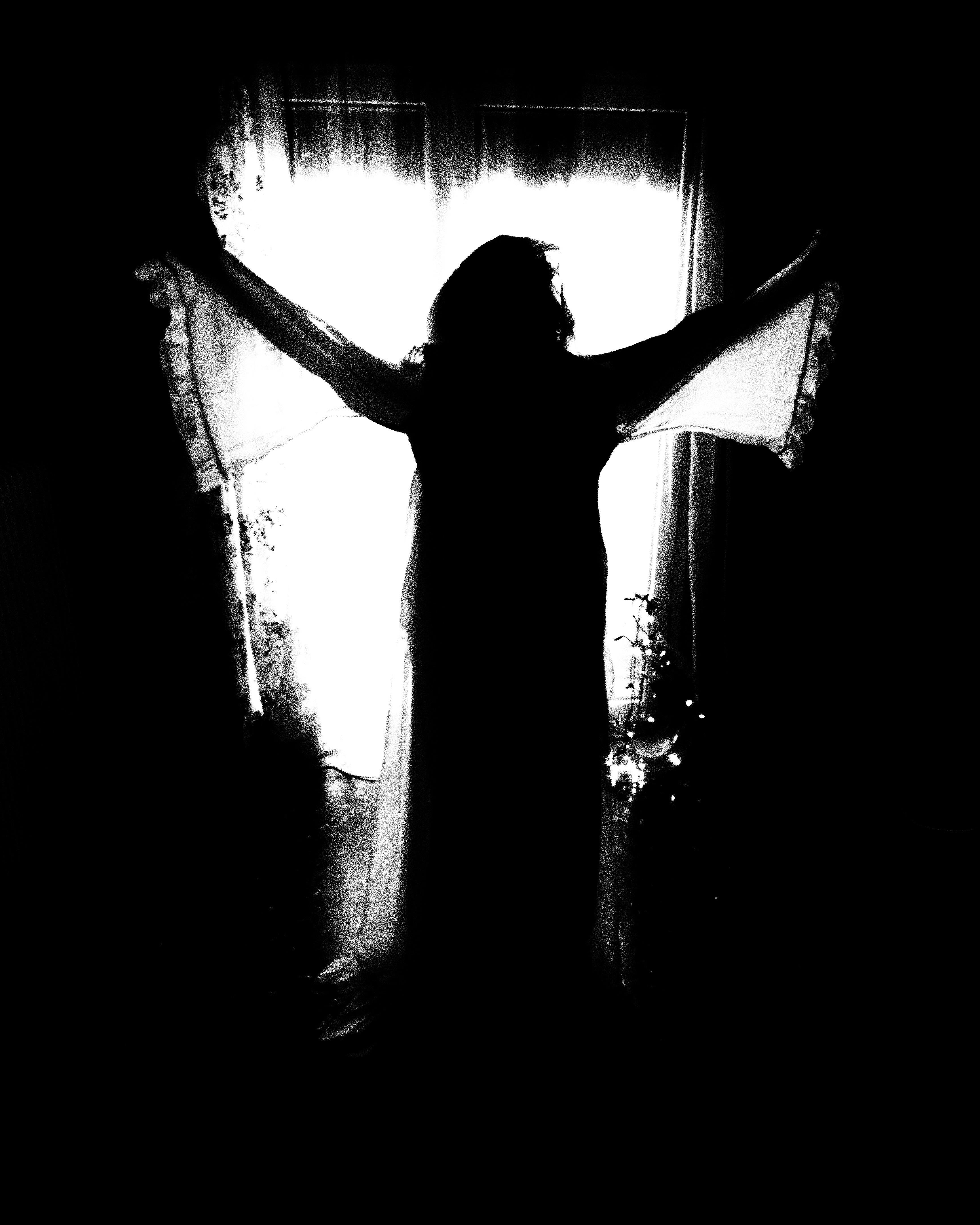 The angel of Darkness. Photo taken with Olympus EM10 mak 2 and the 12
