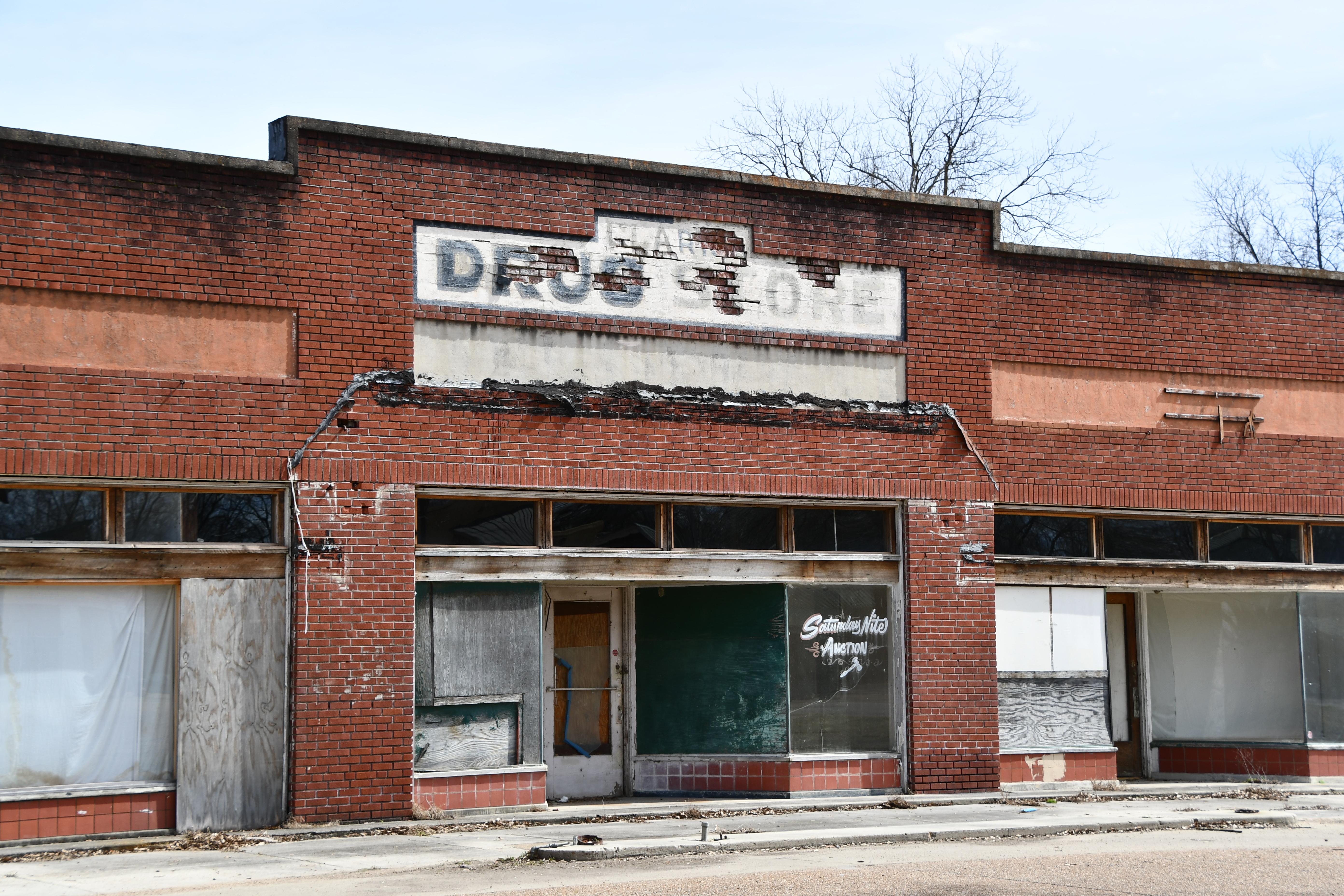 Old drug store in Merigold, Mississippi, population down 33 in last 10