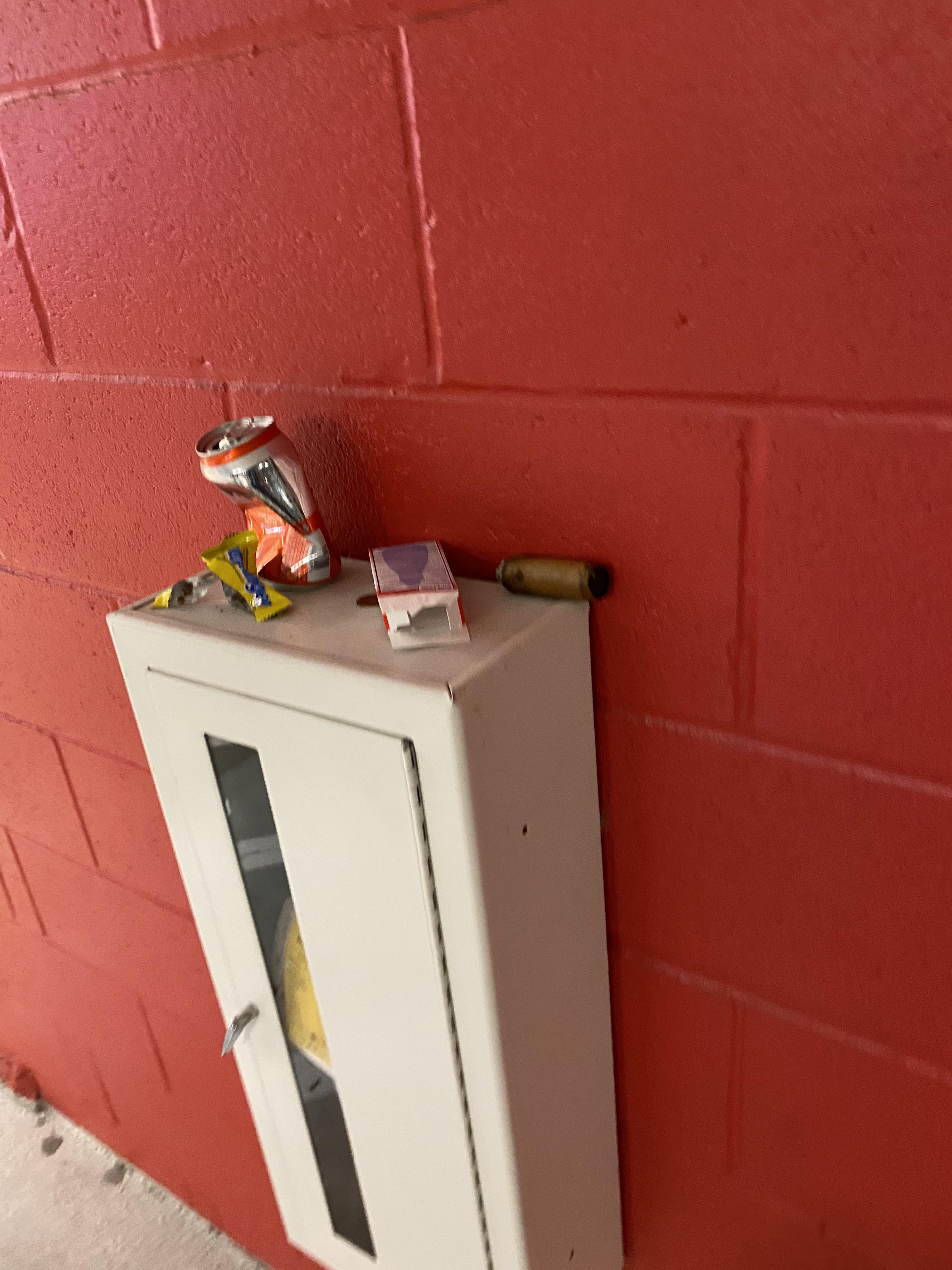 fire extinguisher is a trash can and an ashtray apparently 🙃 it’s not