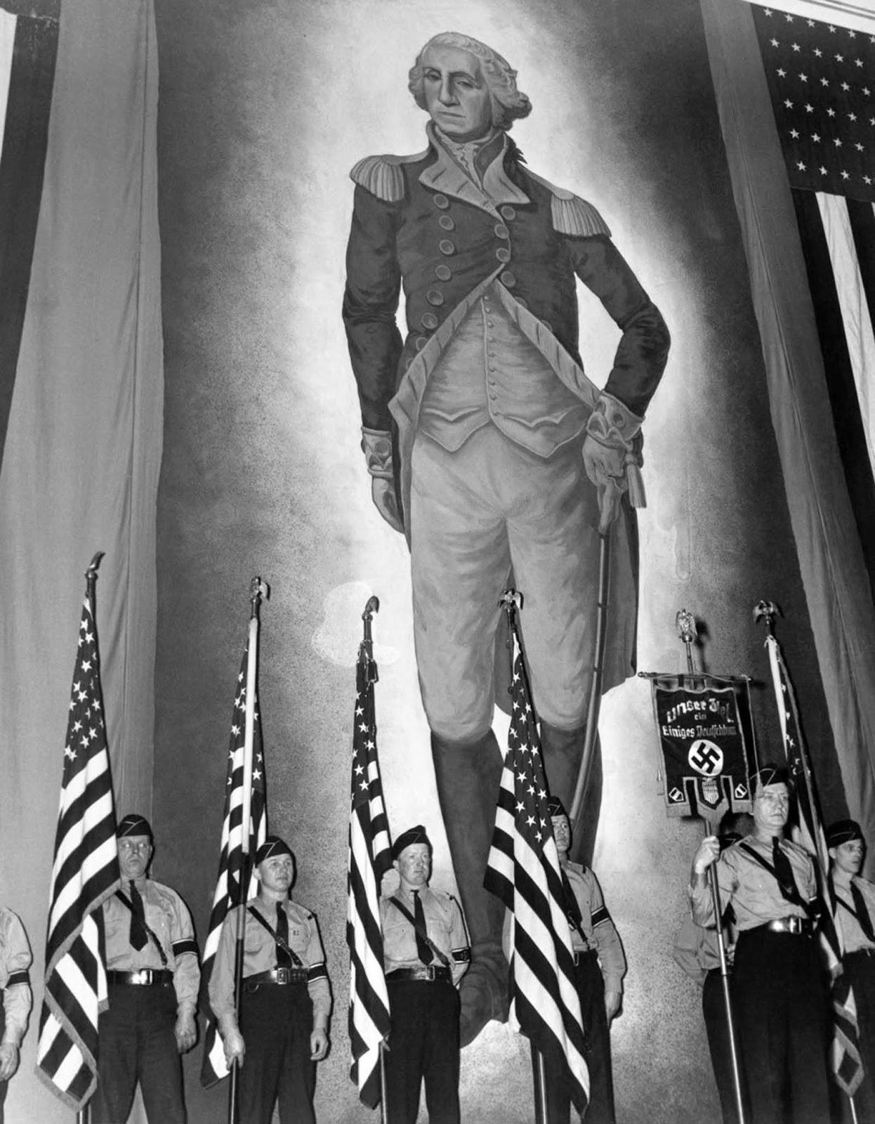 Members of the proNazi German American Bund stand before a massive