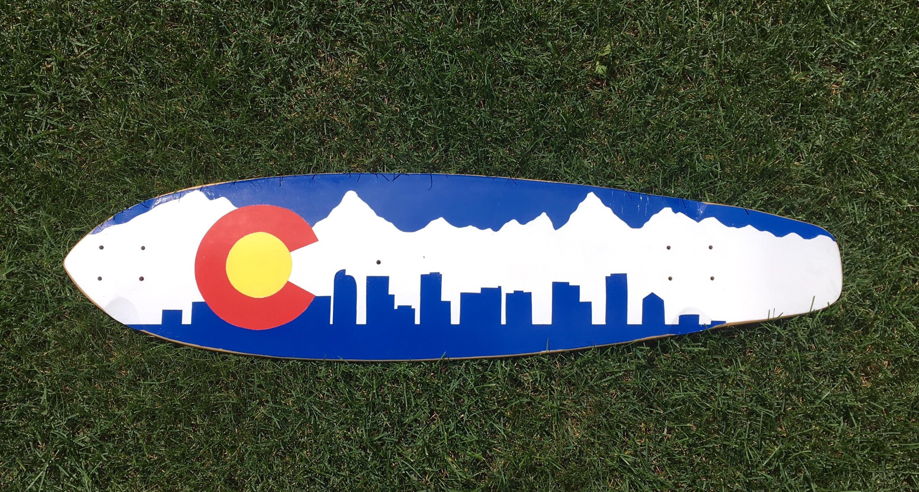 I recently painted my longboard to emulate the Colorado flag using the Rocky Mountains and