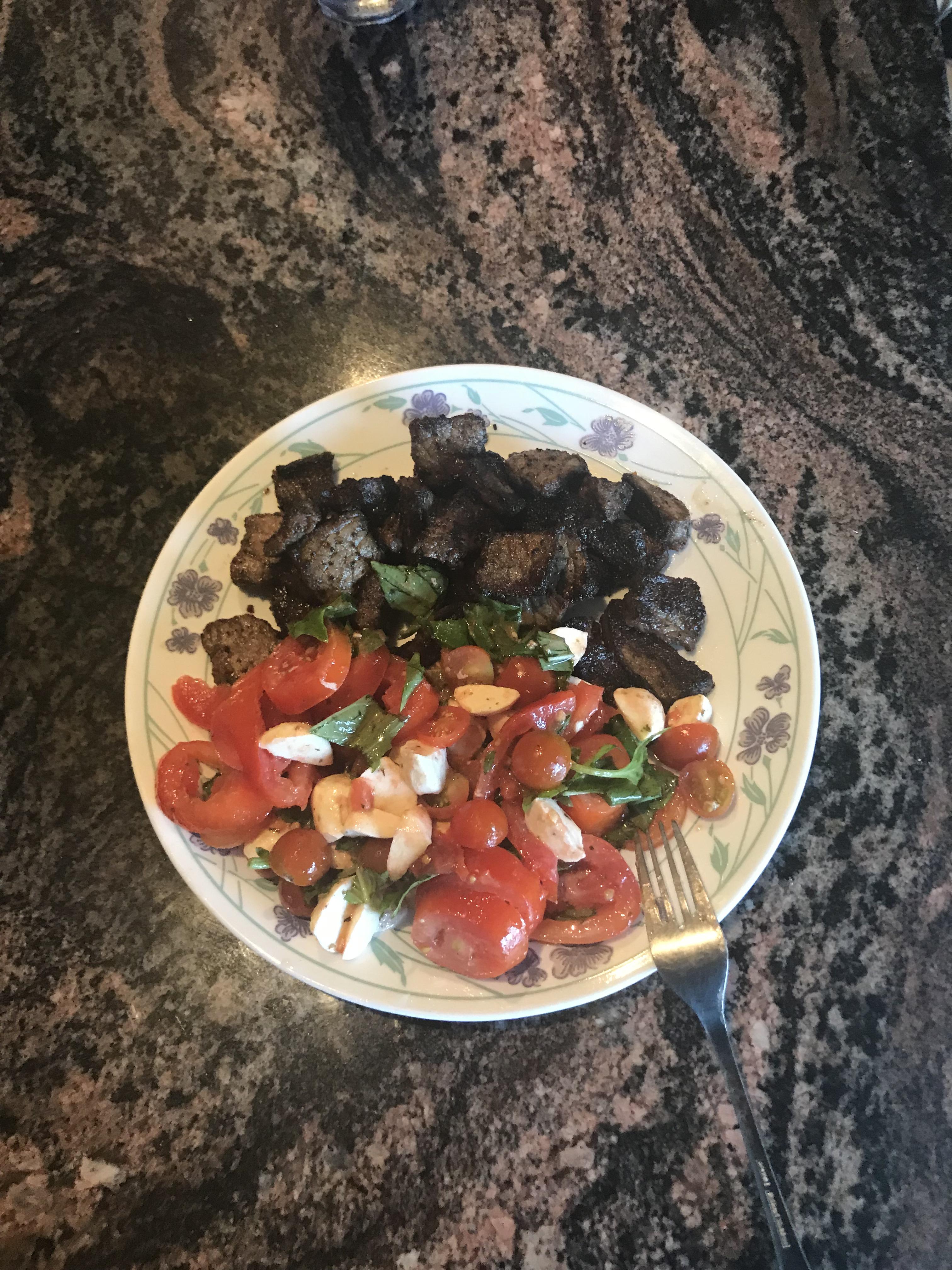 Leftover grass fed chuck roast stir fried with butter and caprese salad