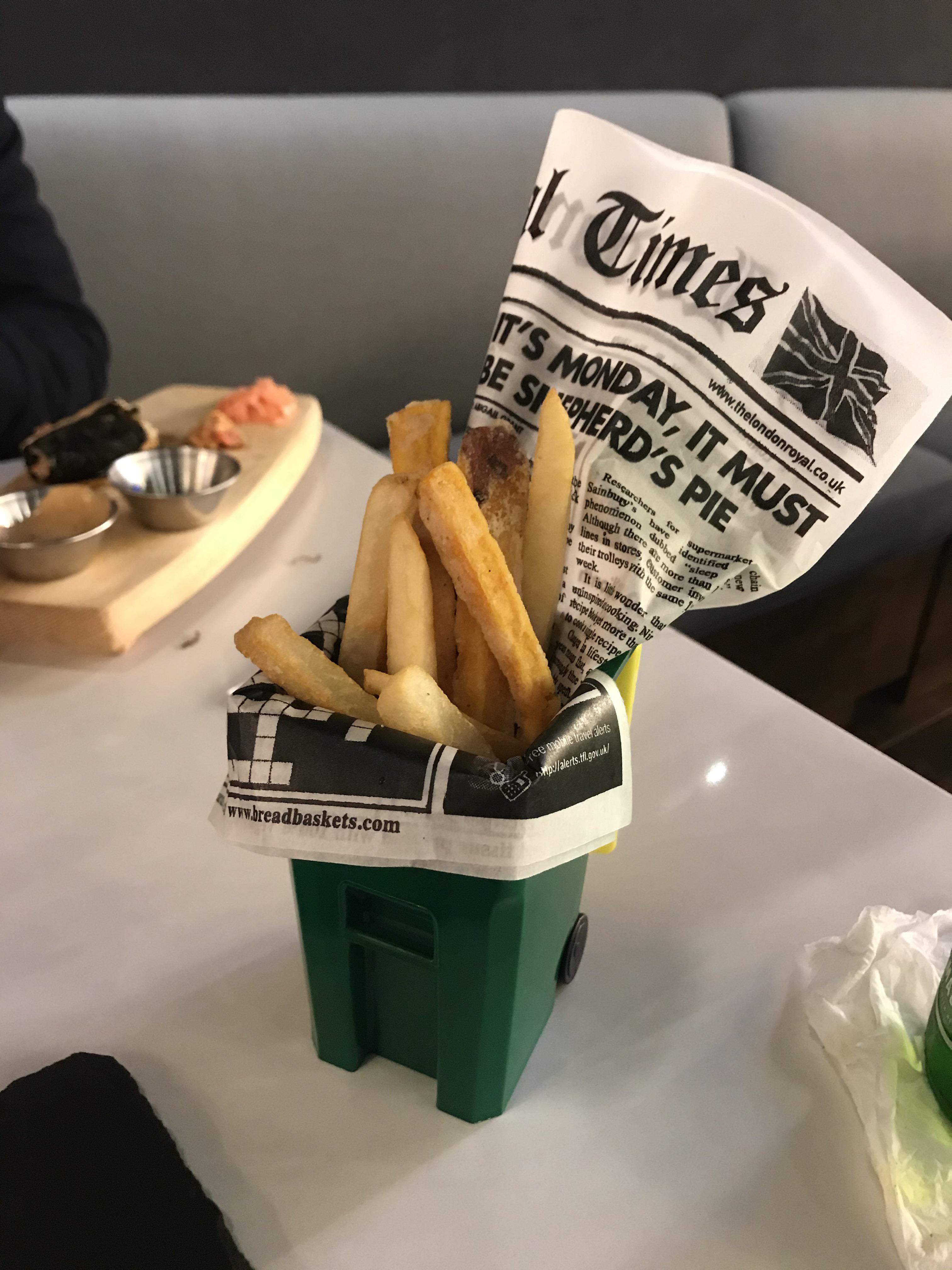 Fries served in a small trash bin. Perfect for Charlie r/penguinz0