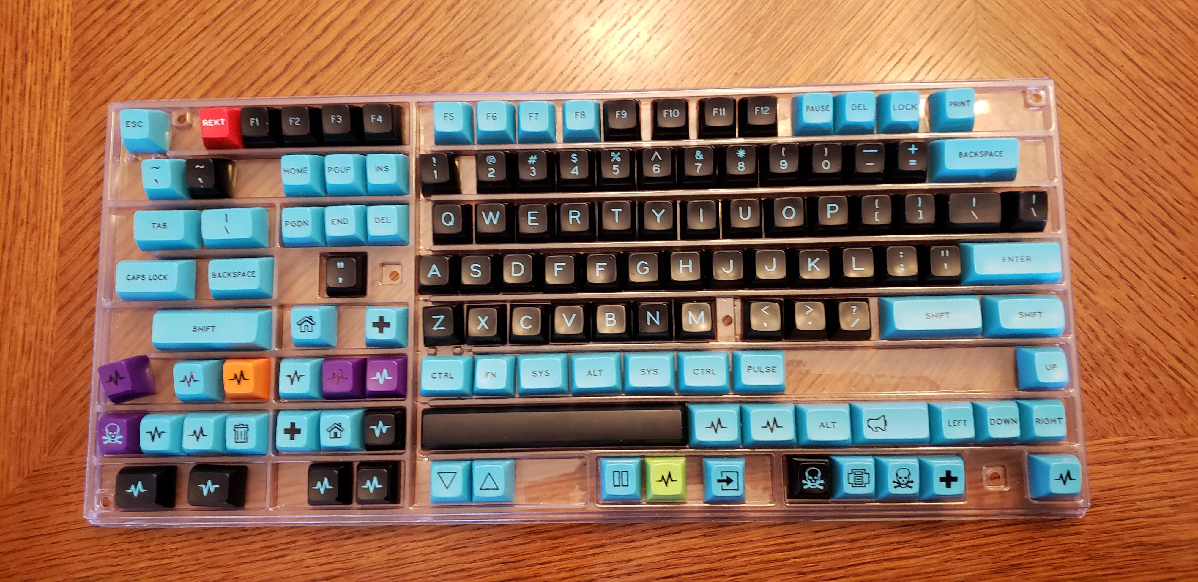 Enjoying the Originative keycap storage trays. Not a perfect fit for SA