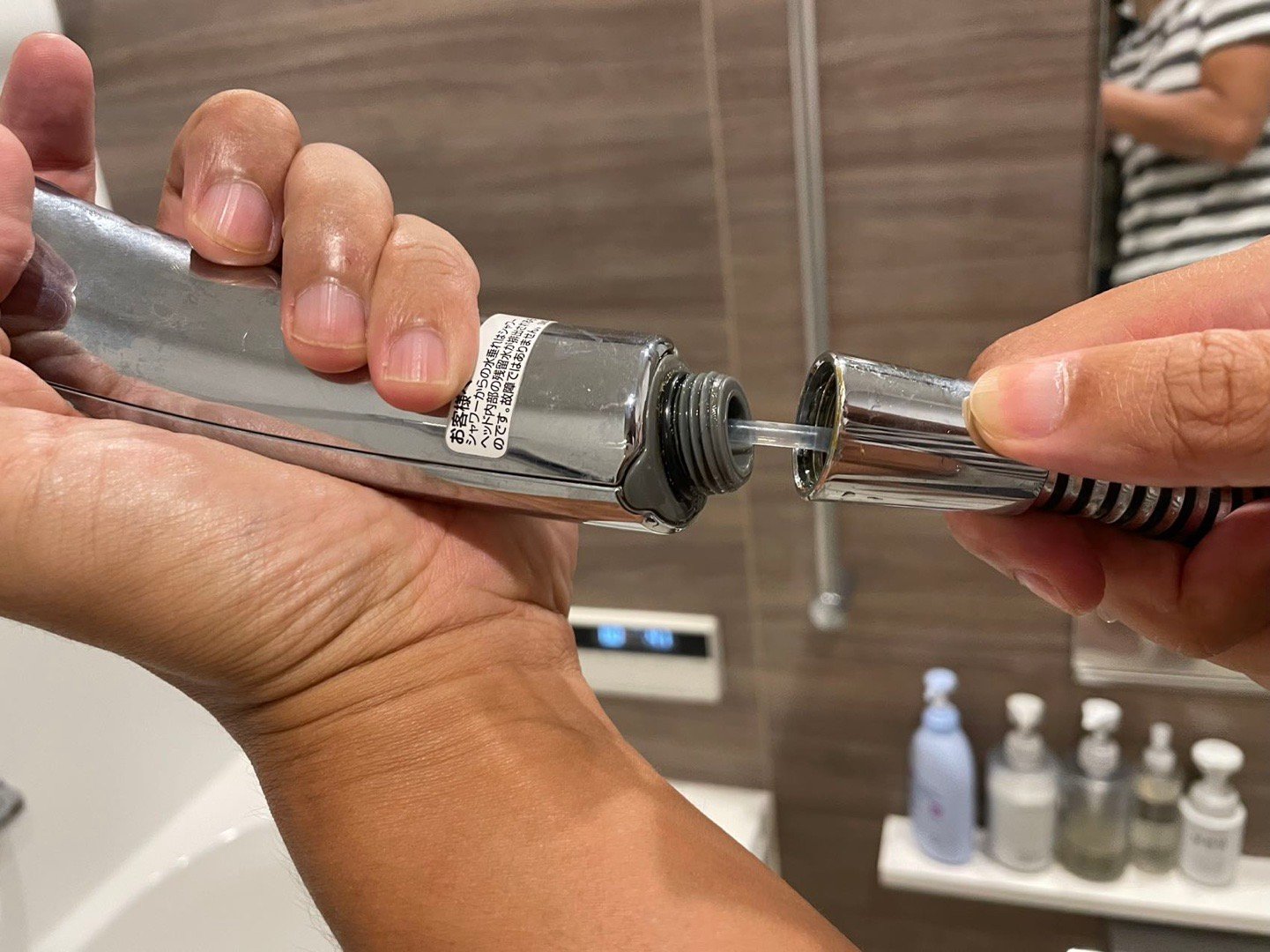 What's this plastic tube thing in the shower head? How do I replace it