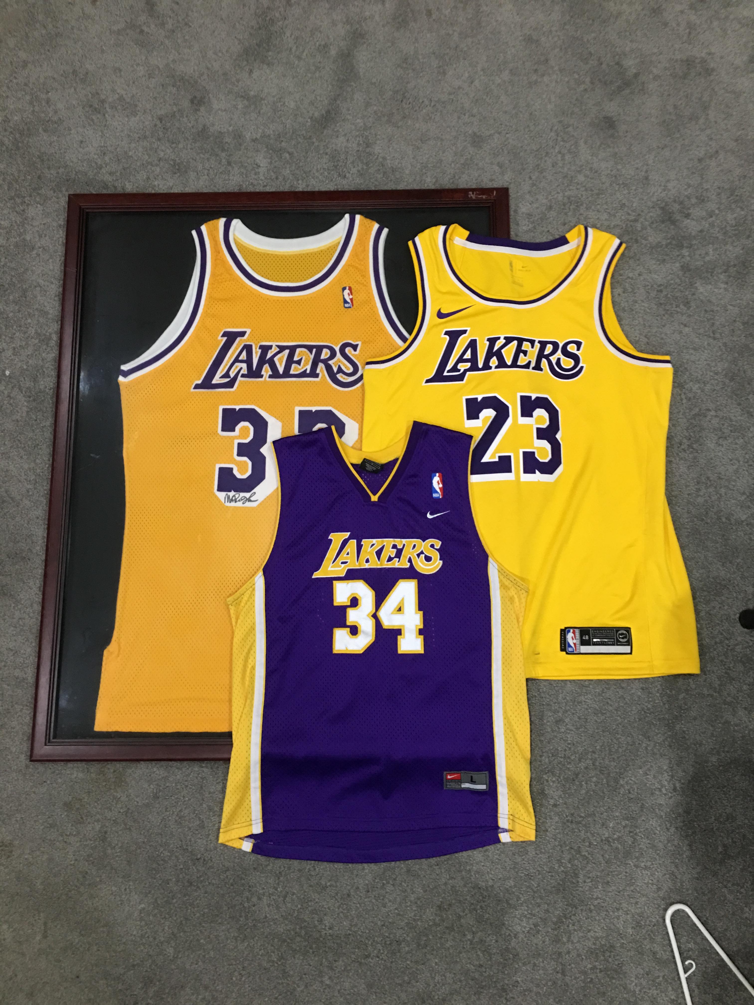 My new LeBron Jersey next to an authentic Magic jersey, and my old Shaq