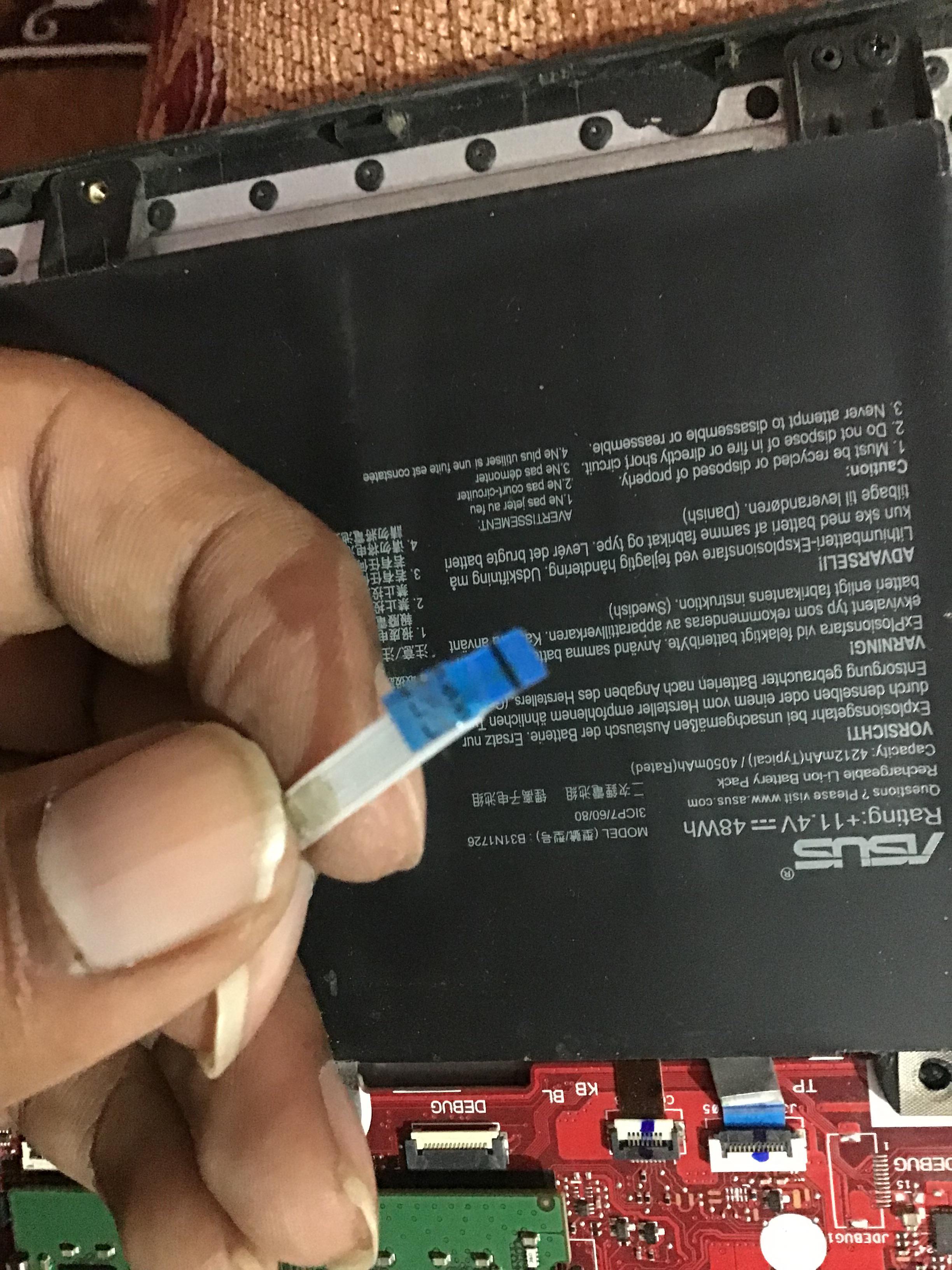 Ripped the rgb ribbon cable. Asus rog strix G512LI.311 I was opening my