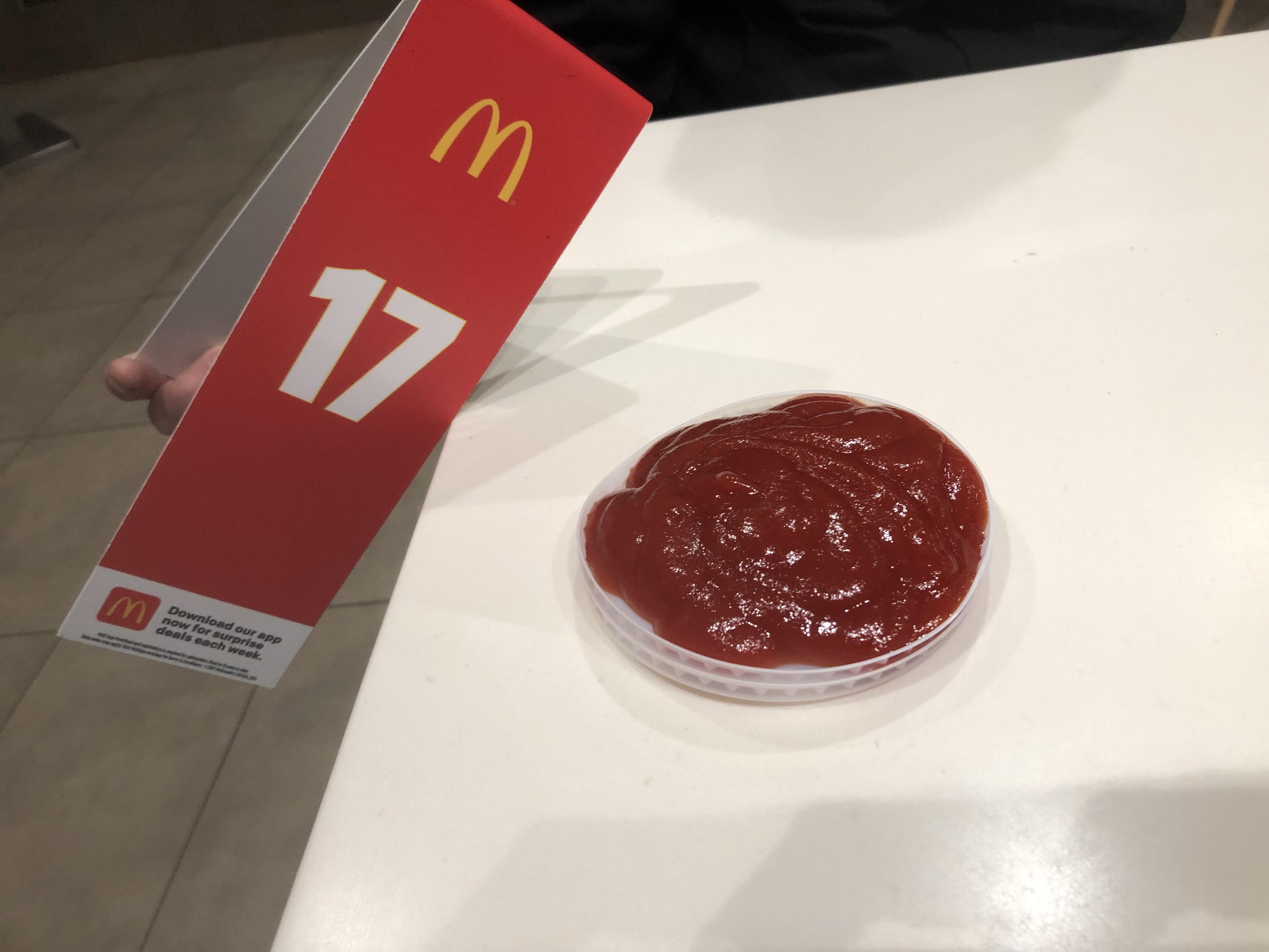 Screw those tiny paper ketchup cups. Instead, use two soda cup lids to