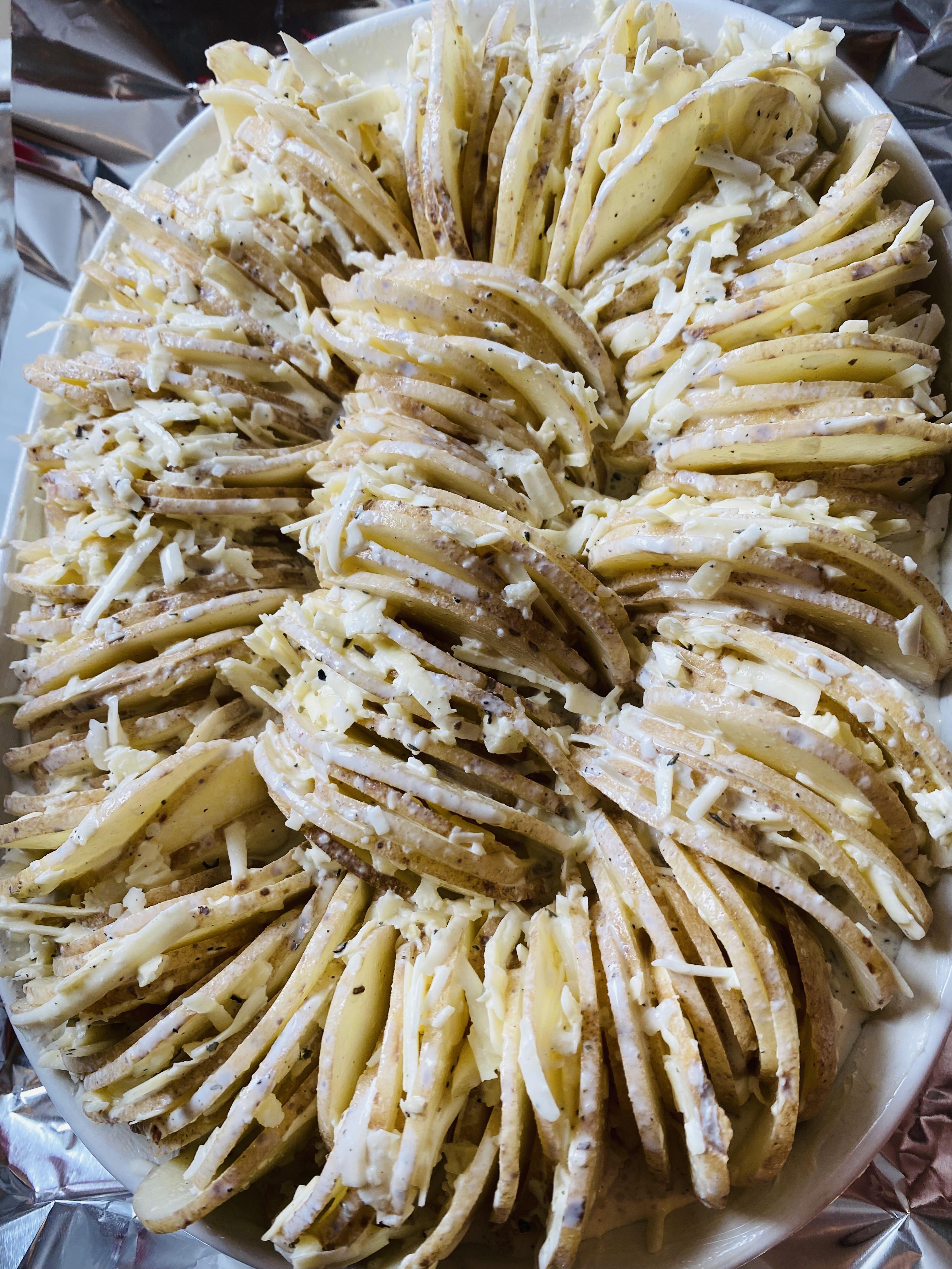 Made the Cheesy Hasselback Potato Gratin from NYT last night. They were great, these are them