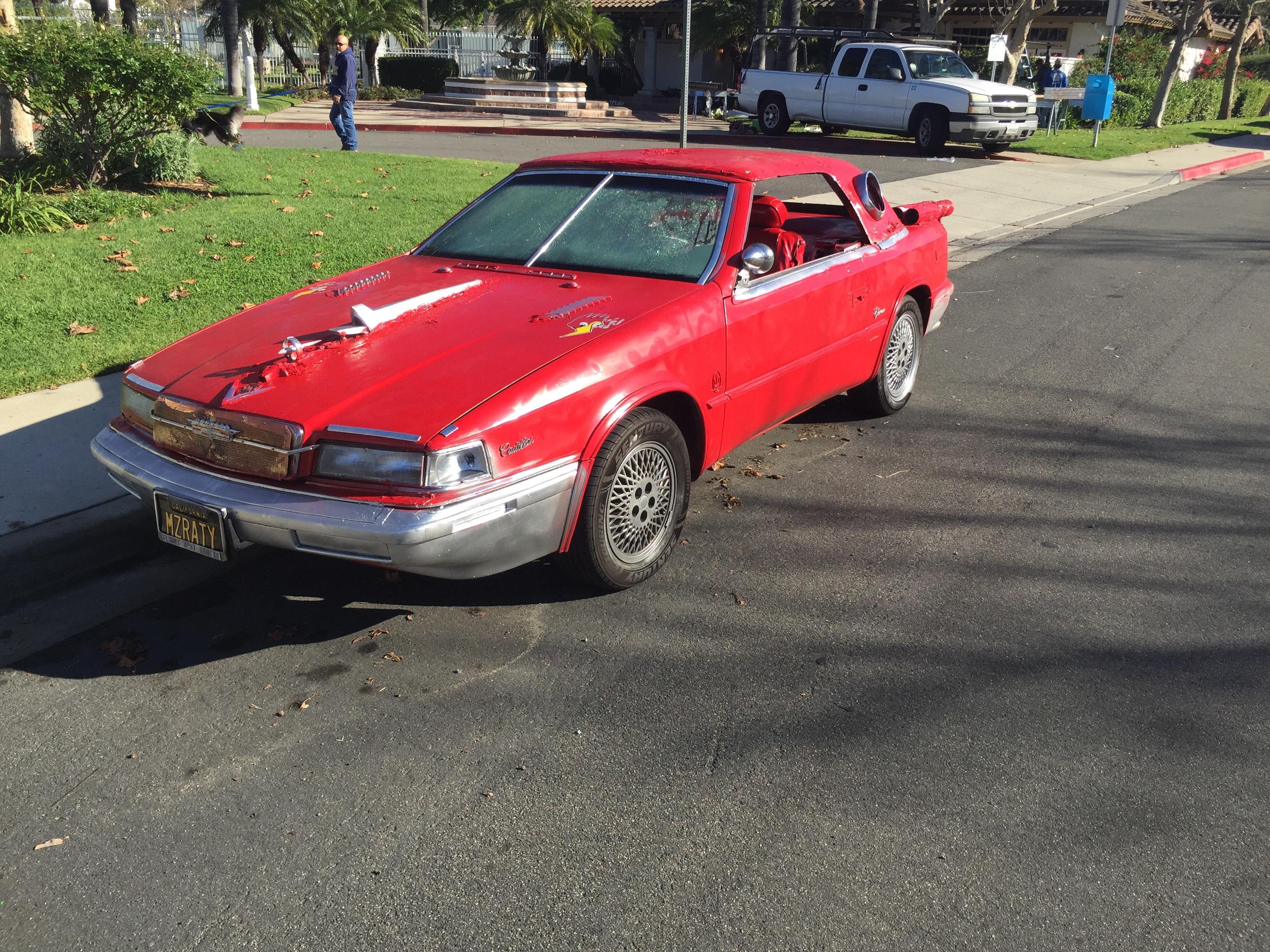Black coat, white shoes, black hat... Cadillac?? r/Shitty_Car_Mods