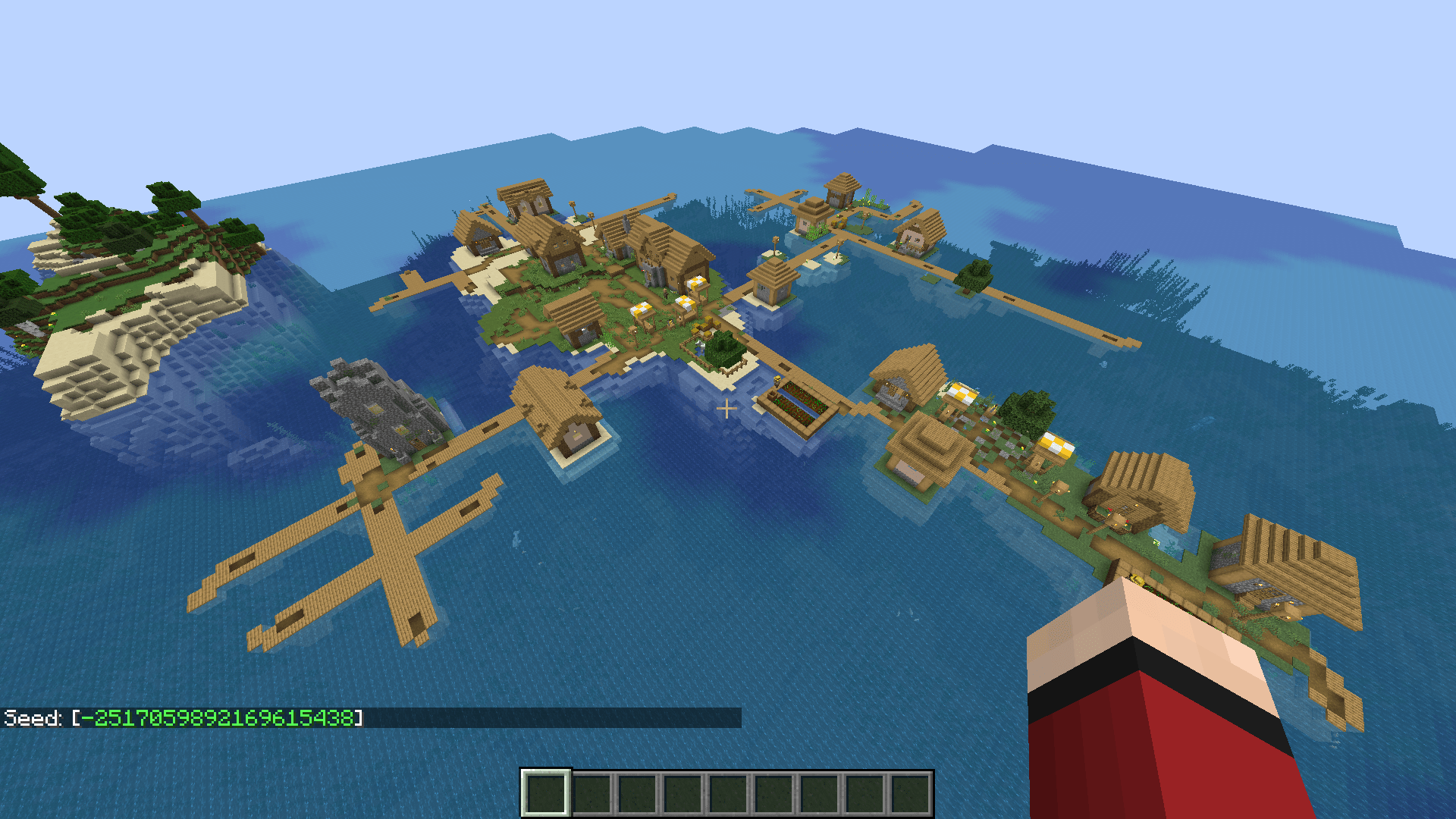 Ocean village with an ocean monument next to it r/minecraftseeds