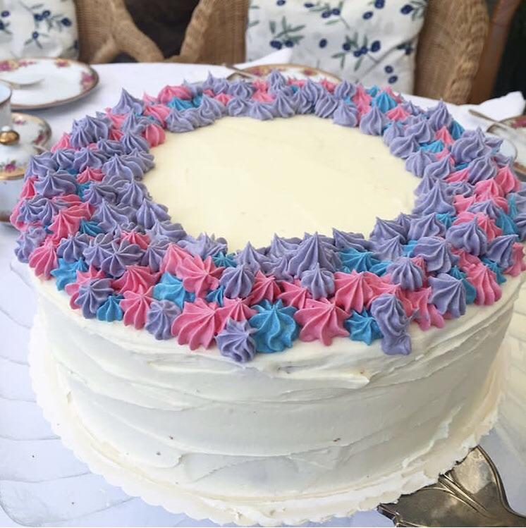 A funfetti Cake I made a while ago, still loving how it turned out. 3 layers of cake and a