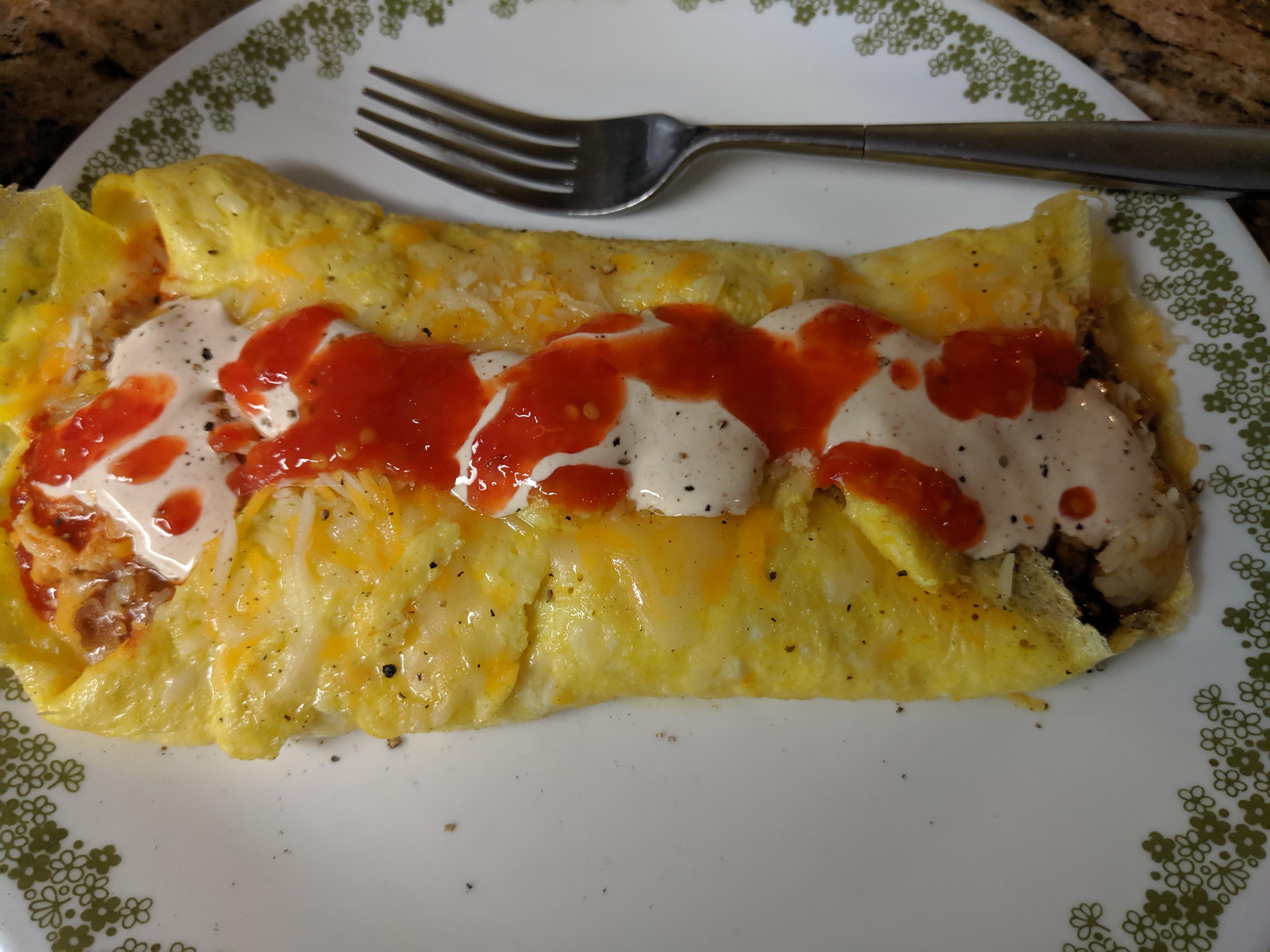 Buffalo chicken salad omelette with Texas caviar salsa and some red hot