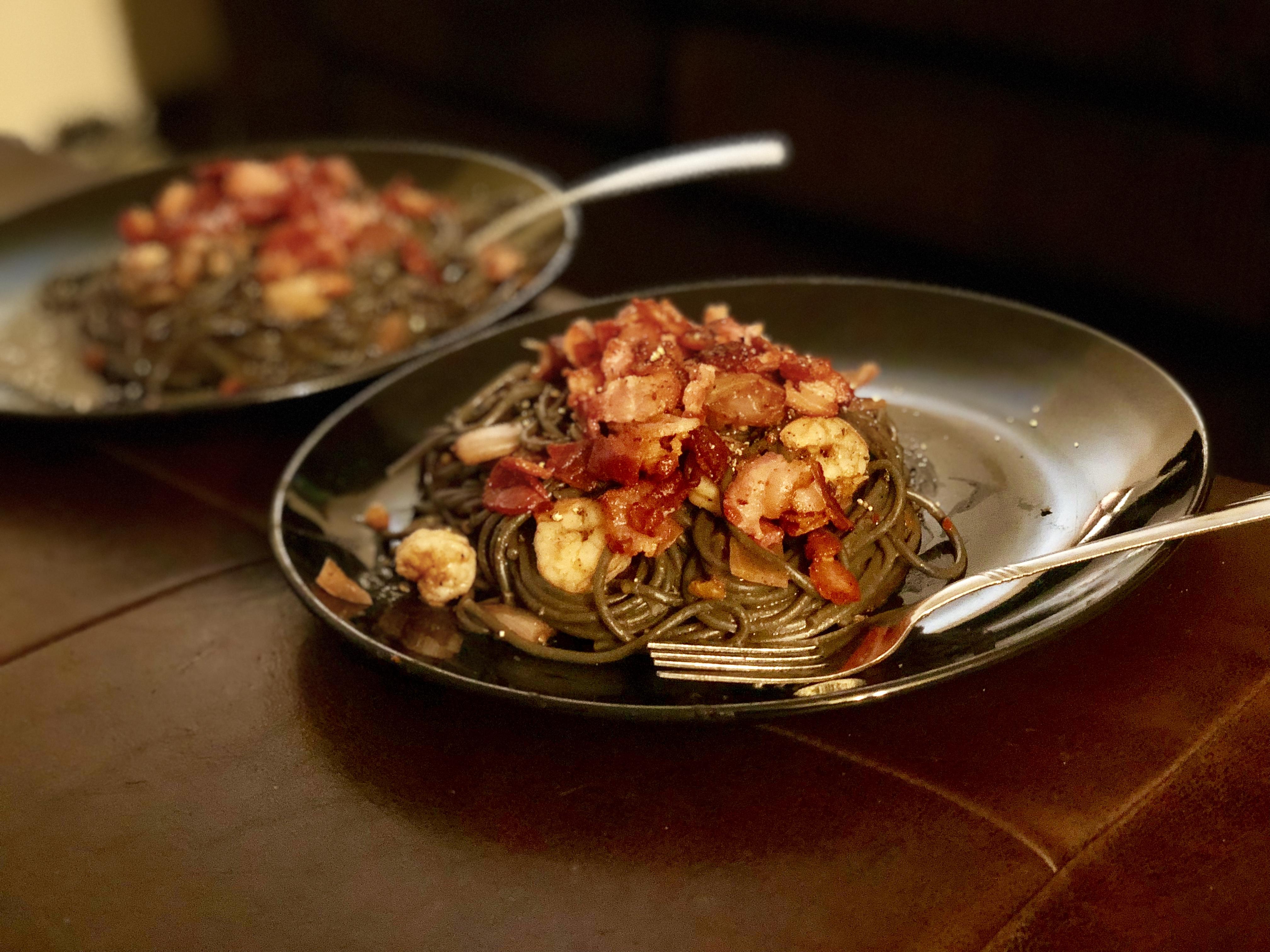 [Homemade] Squid ink pasta with shrimp, bacon, and a red onion garlic