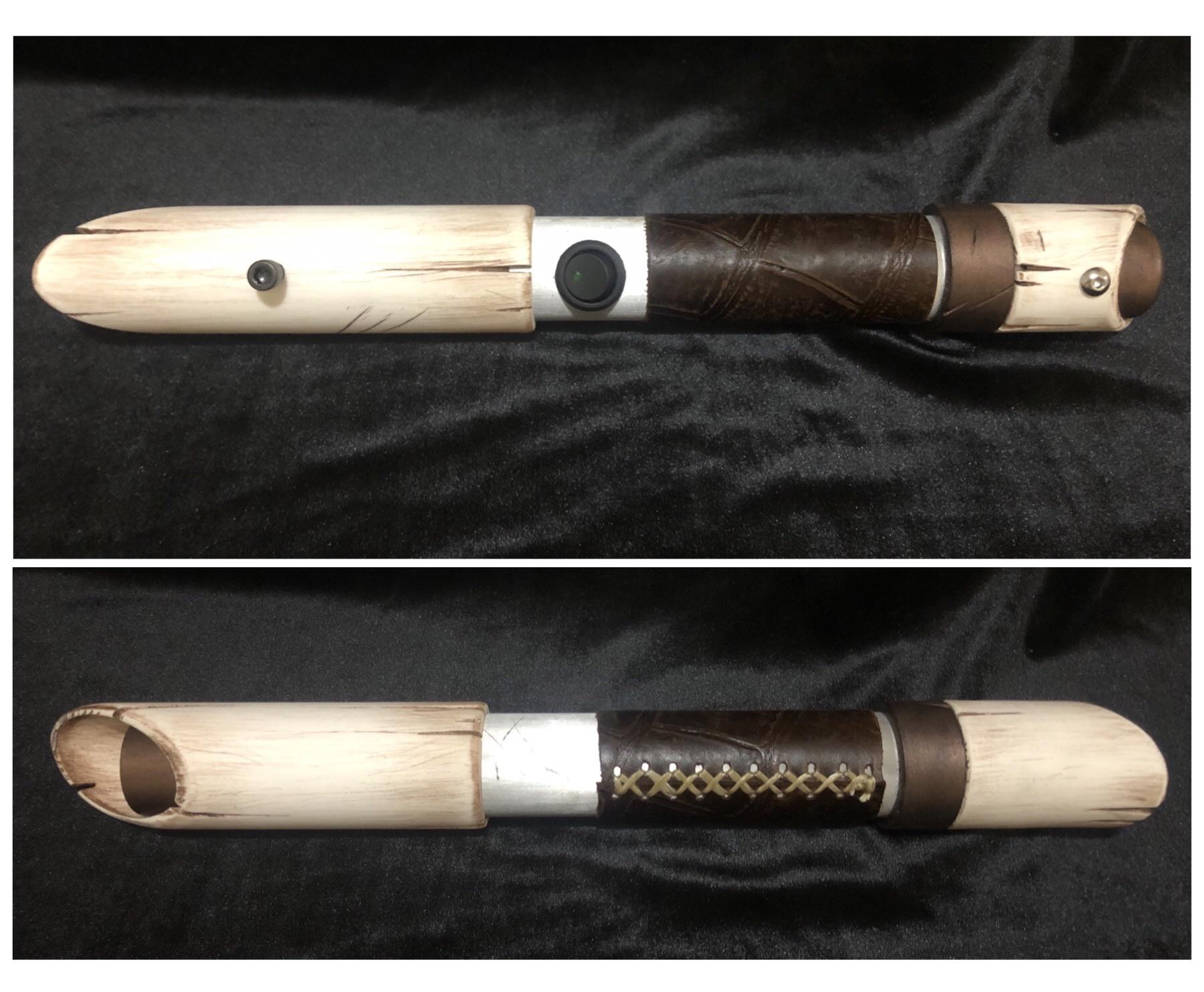 Krayt Dragon 2.0 Aluminum body, leather grip, and faux bone emitter