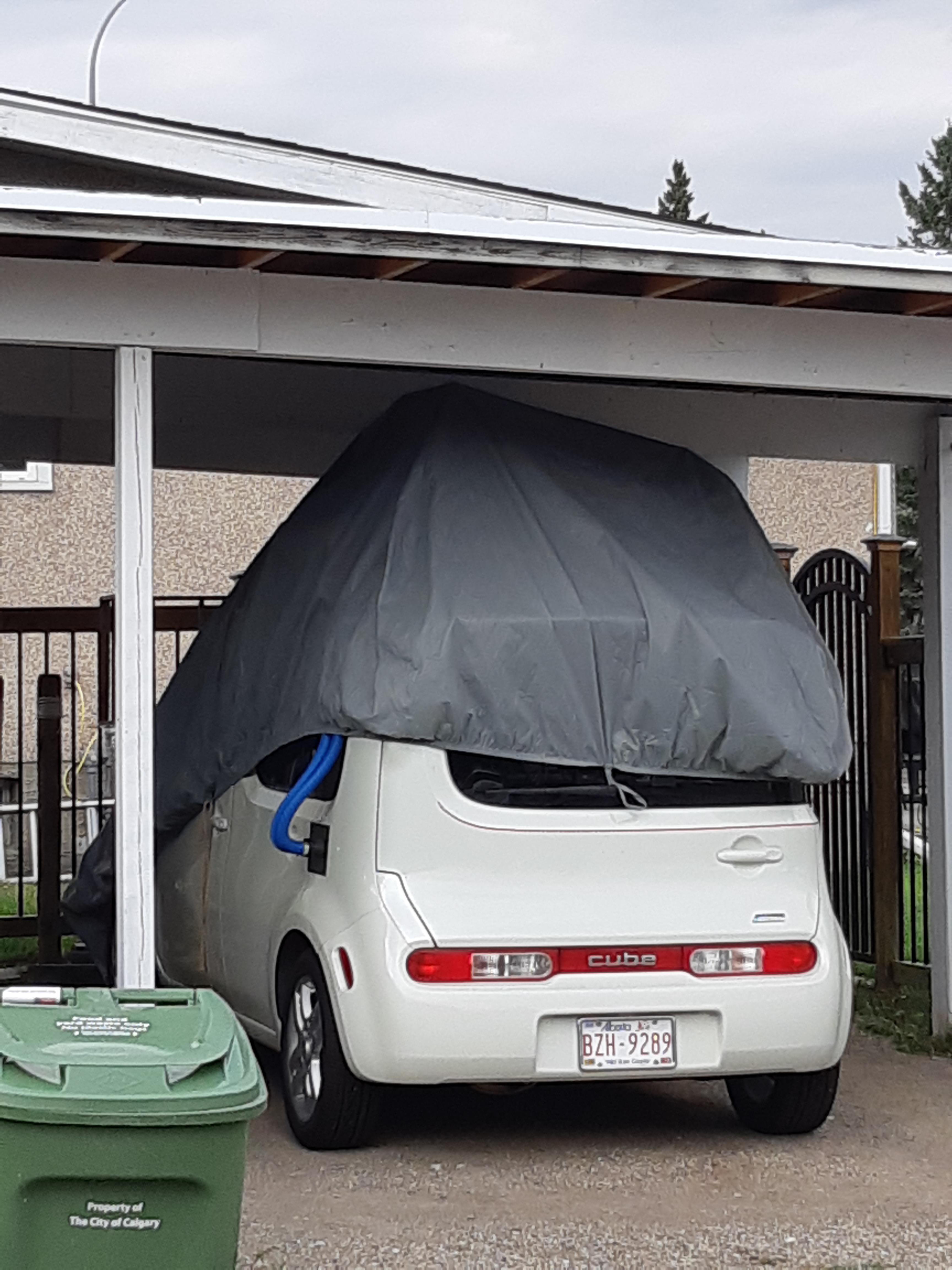 Spotted in Calgary,Alberta something appears to be going into the gas