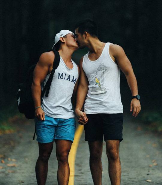 Men Kissing