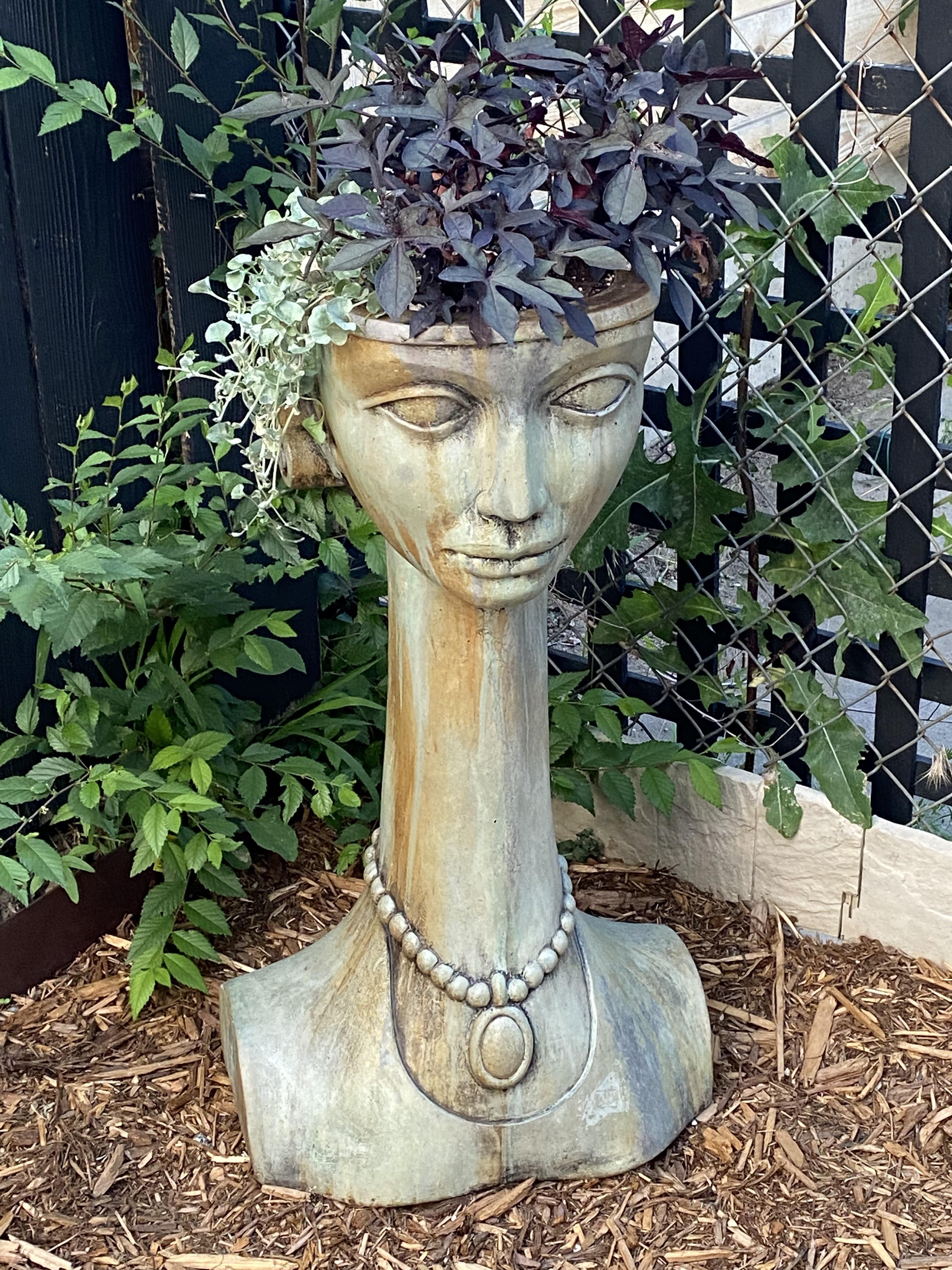 Is it just me or does my lawn decoration somehow look like Charo? r