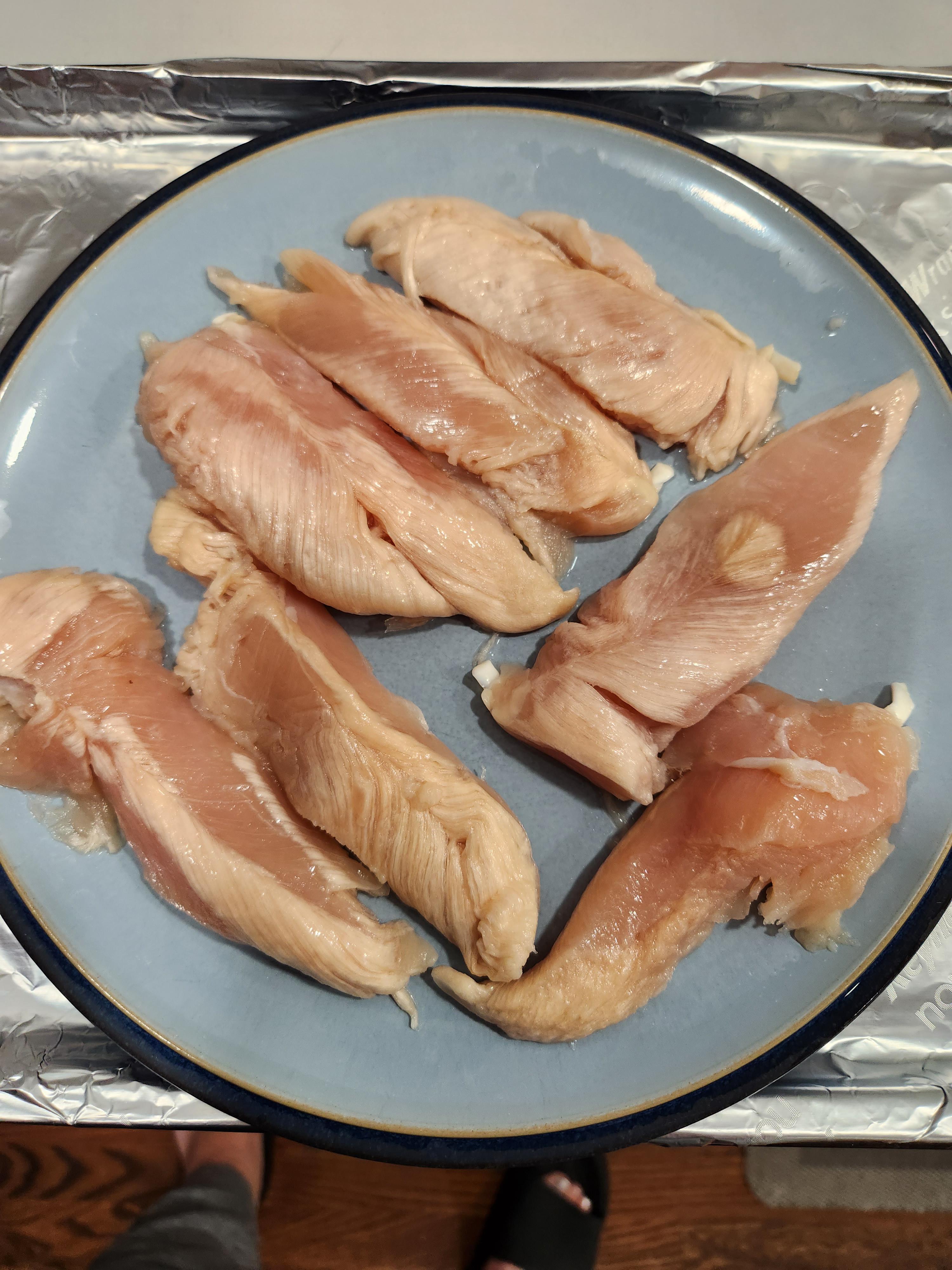 Chicken defrosted in fridge, but looks partially white? r/foodsafety