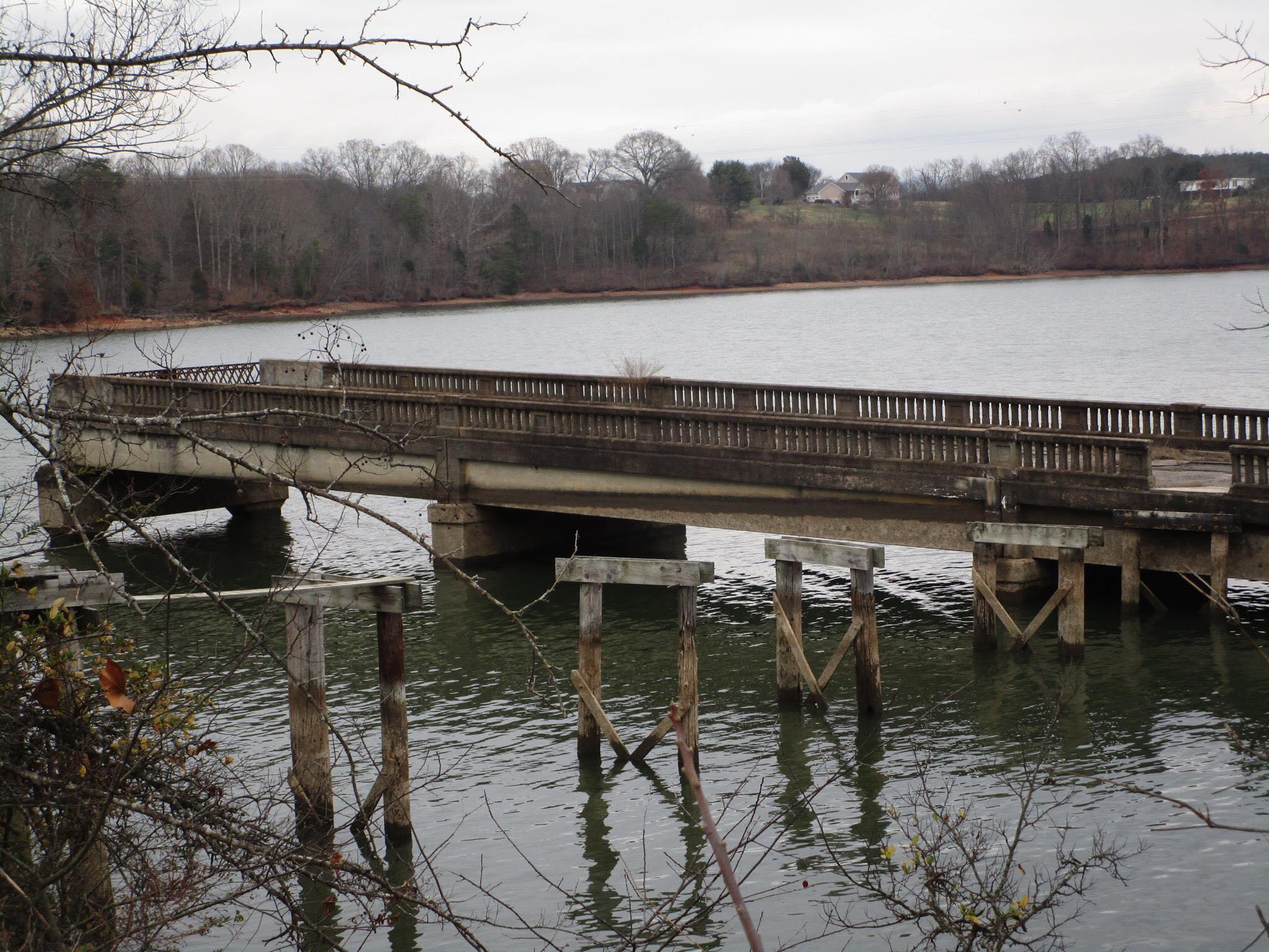 A partially submerged highway bridge in Vonore, Tennessee. The bridge