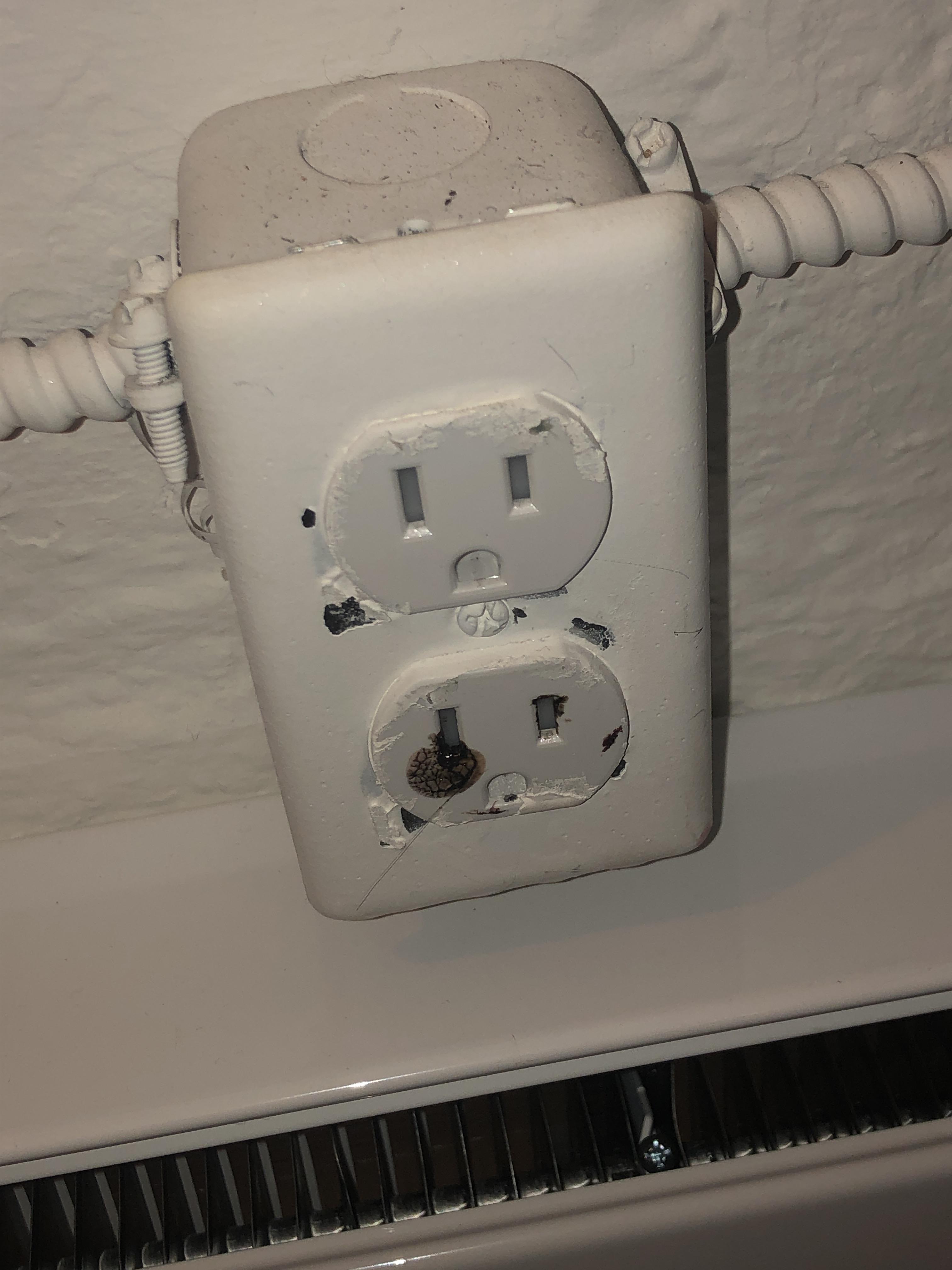This weird brownish liquid that seems to be coming out of this outlet