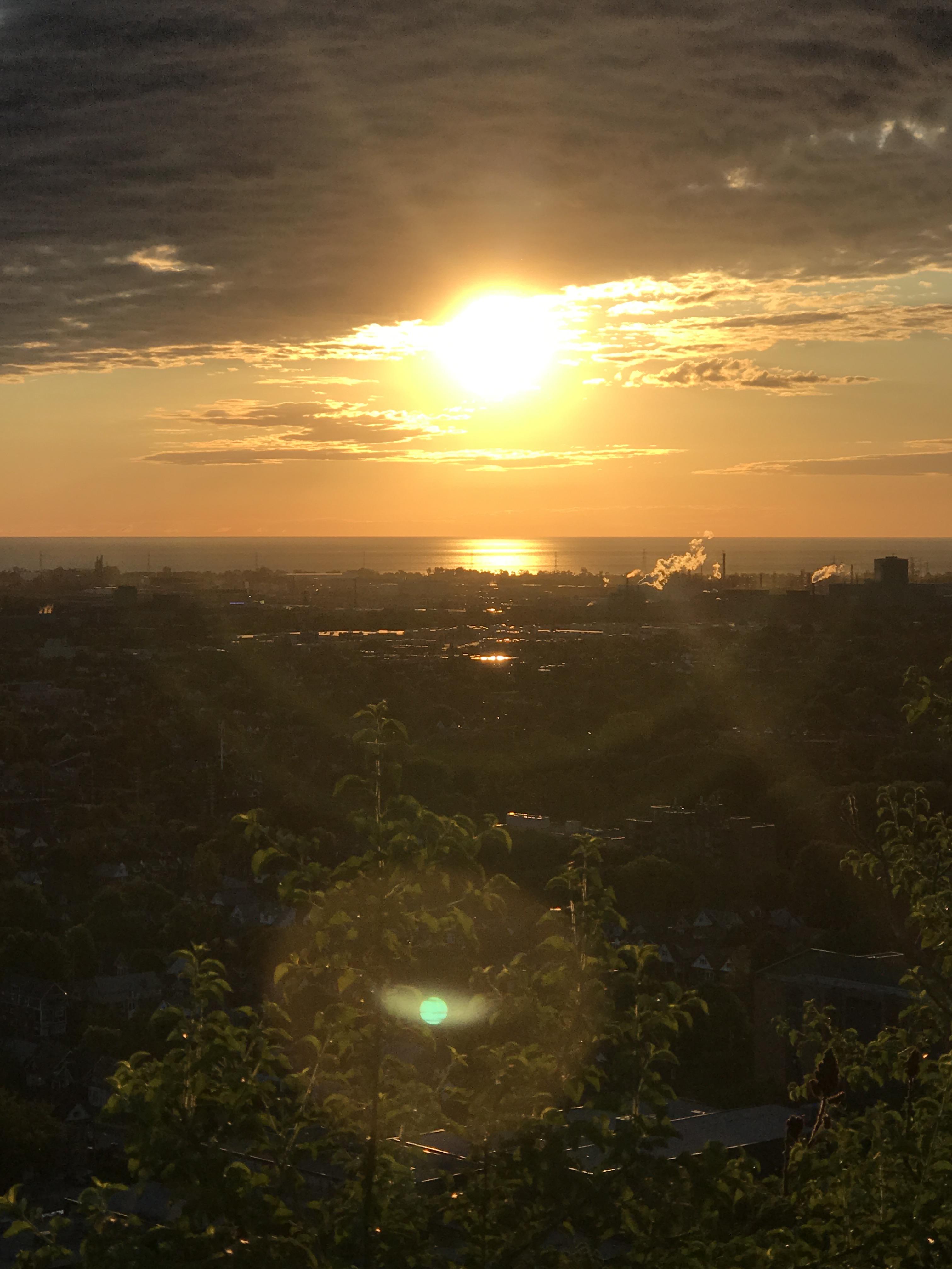 Sunrise on the mountain with views of the lake r/Hamilton