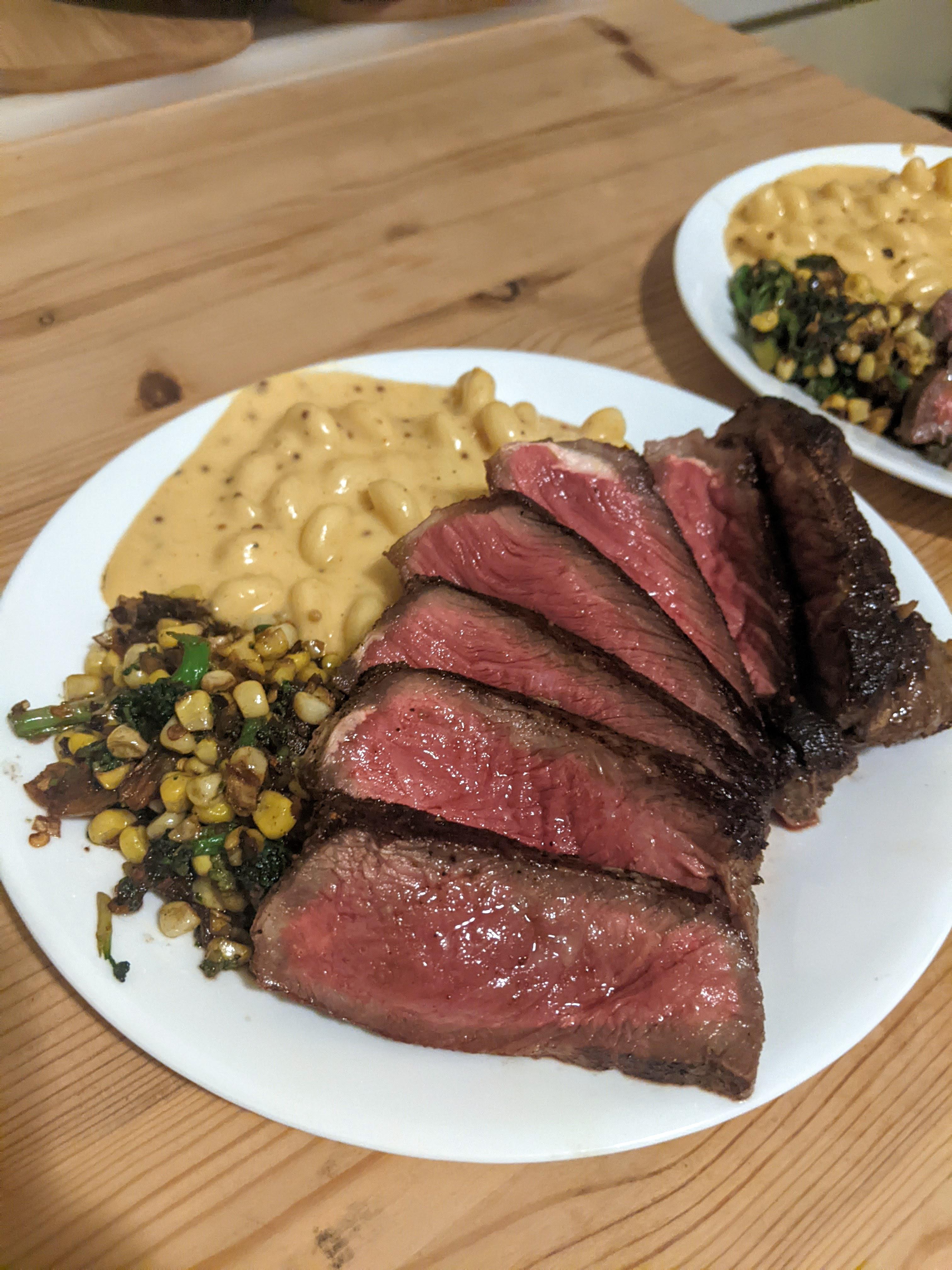 [Homemade] Garlic butterbasted New York strip with mac & cheese and sautéed veggies r/food