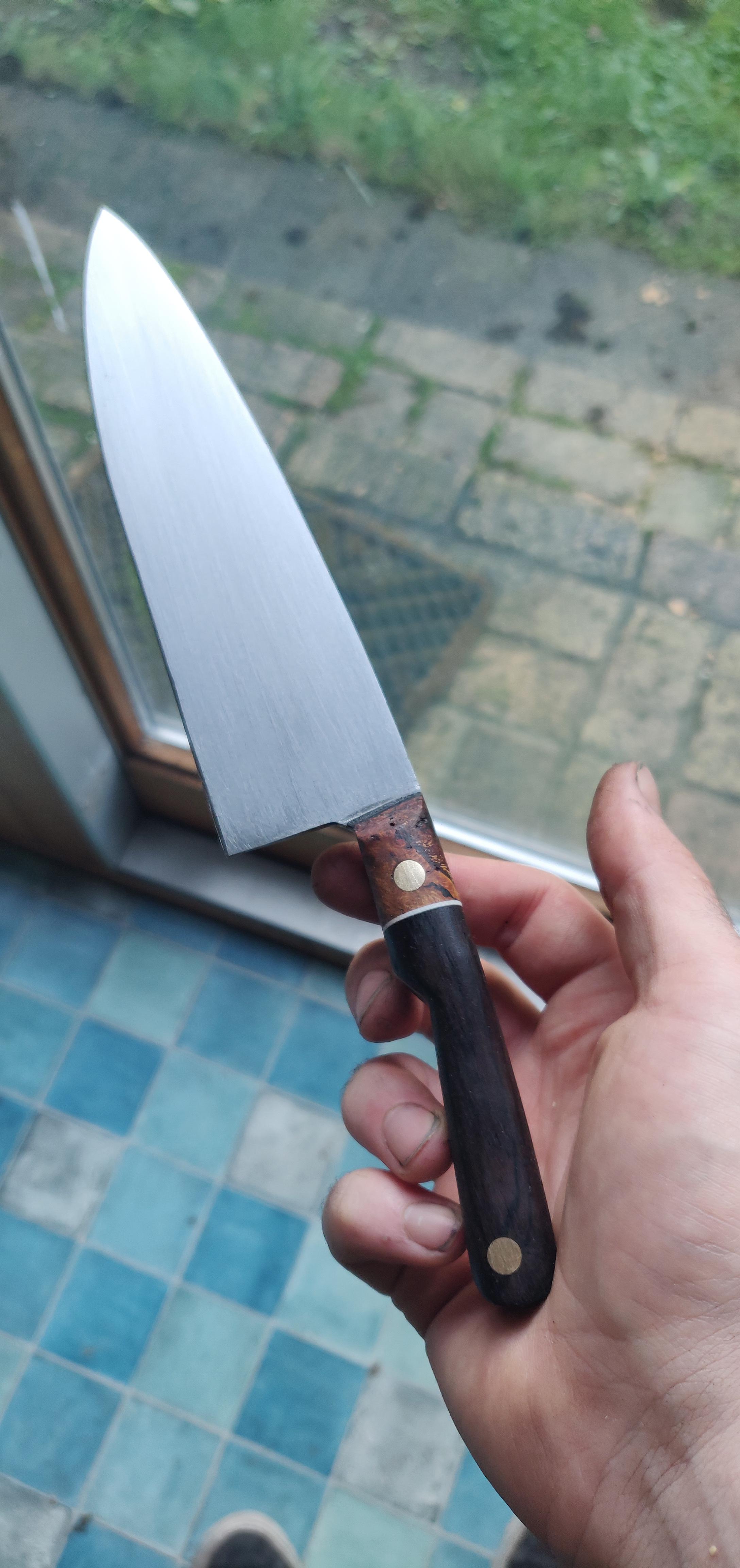 My first knife ever, finally complete. 7 inch chef, 11 inch total