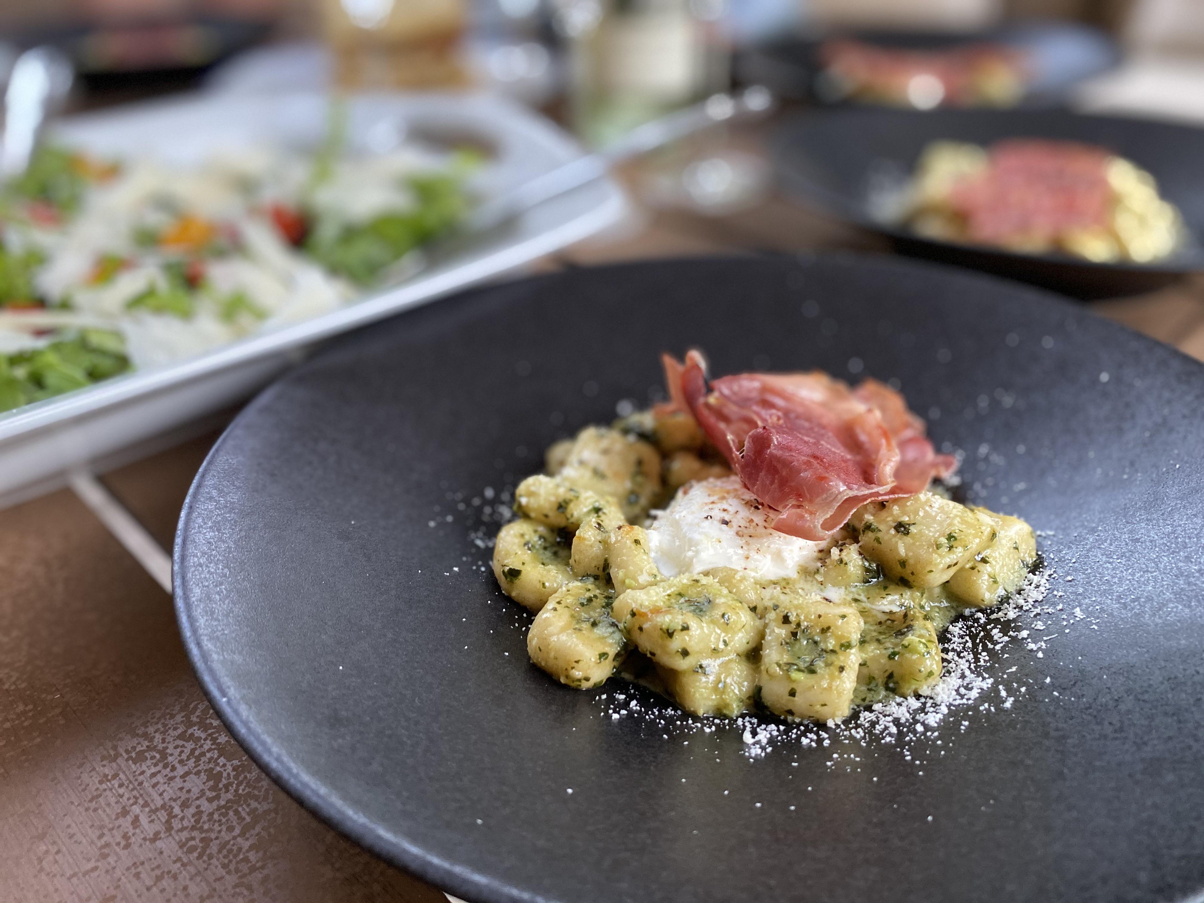 Homemade Gnocchi with fresh pesto, burrata, prosciutto crisp r/pasta