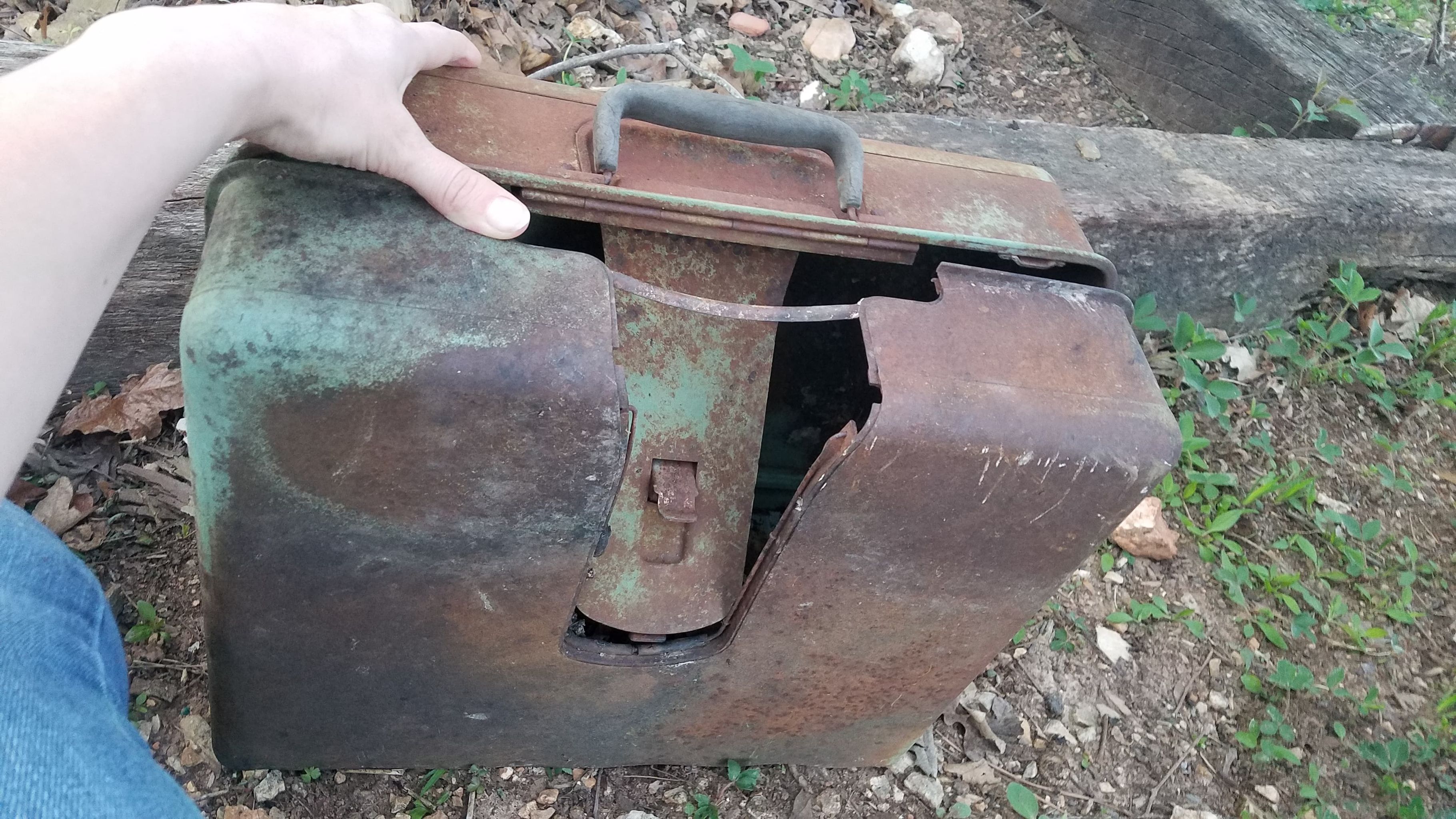 This metal box my friend found in a rural Arkansas field. r