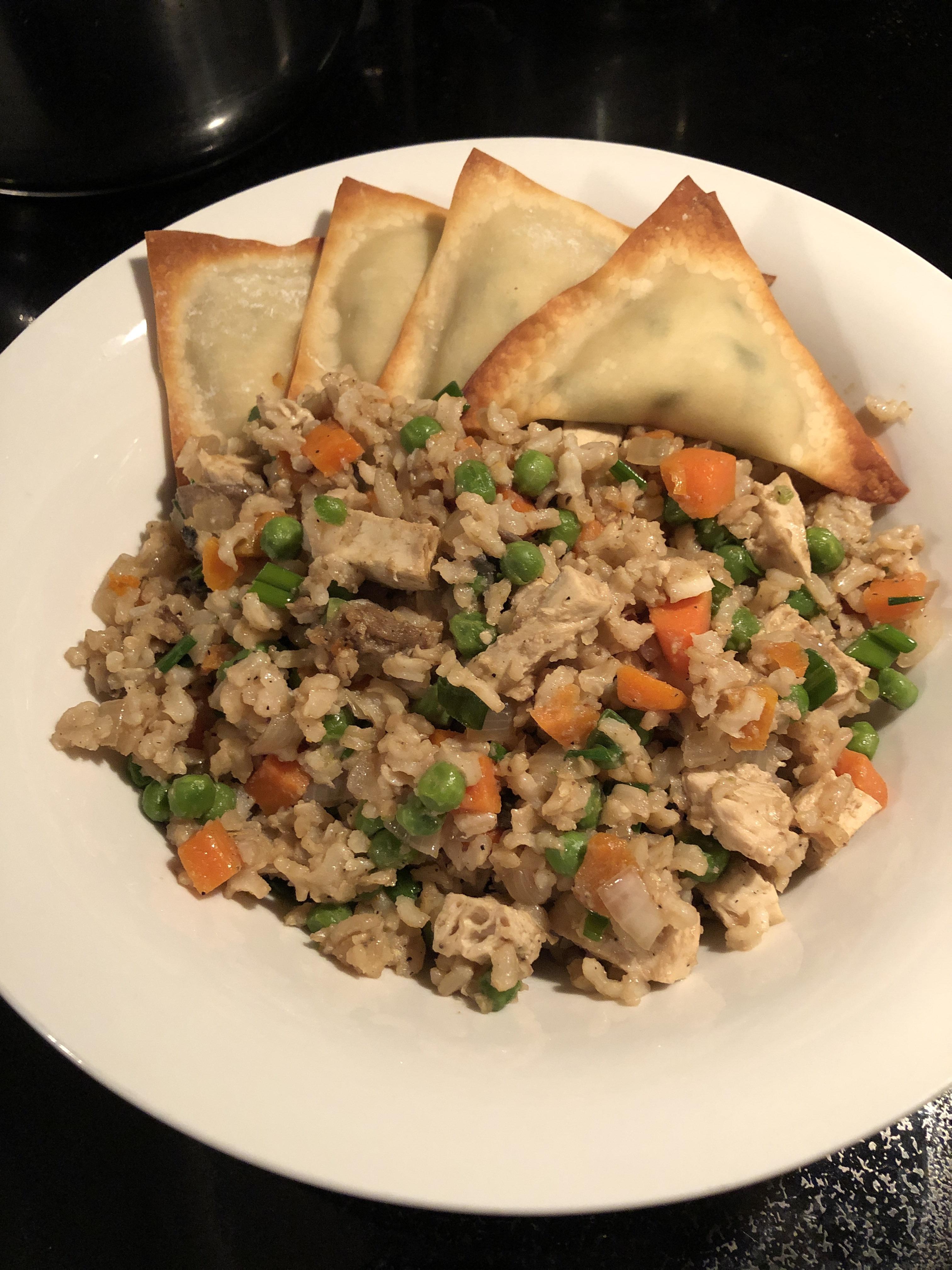 Vegan chicken fried rice and “crab” rangoon made with jackfruit r