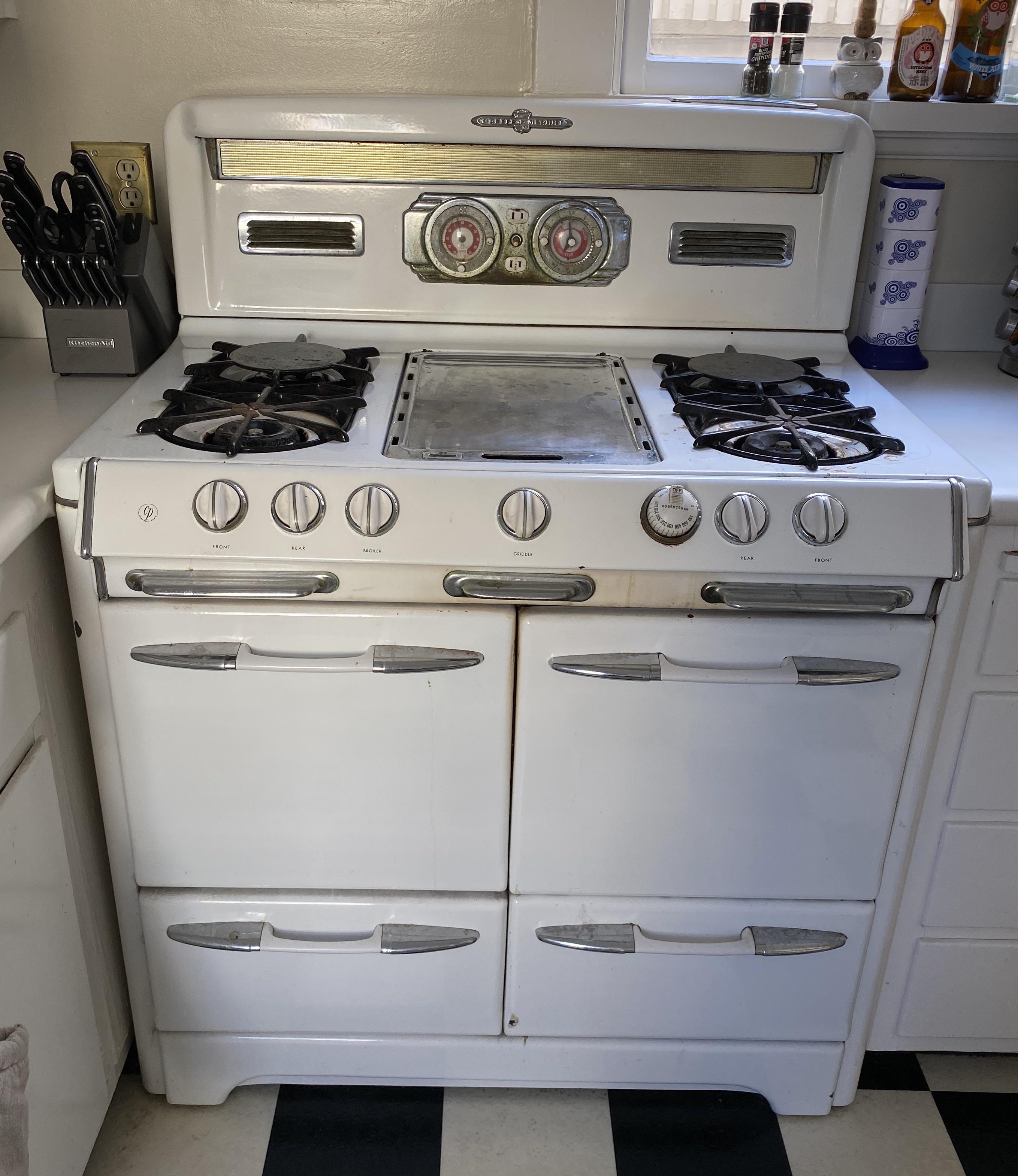 If we’re doing old stoves, here’s mine from the 1920s. Notice the