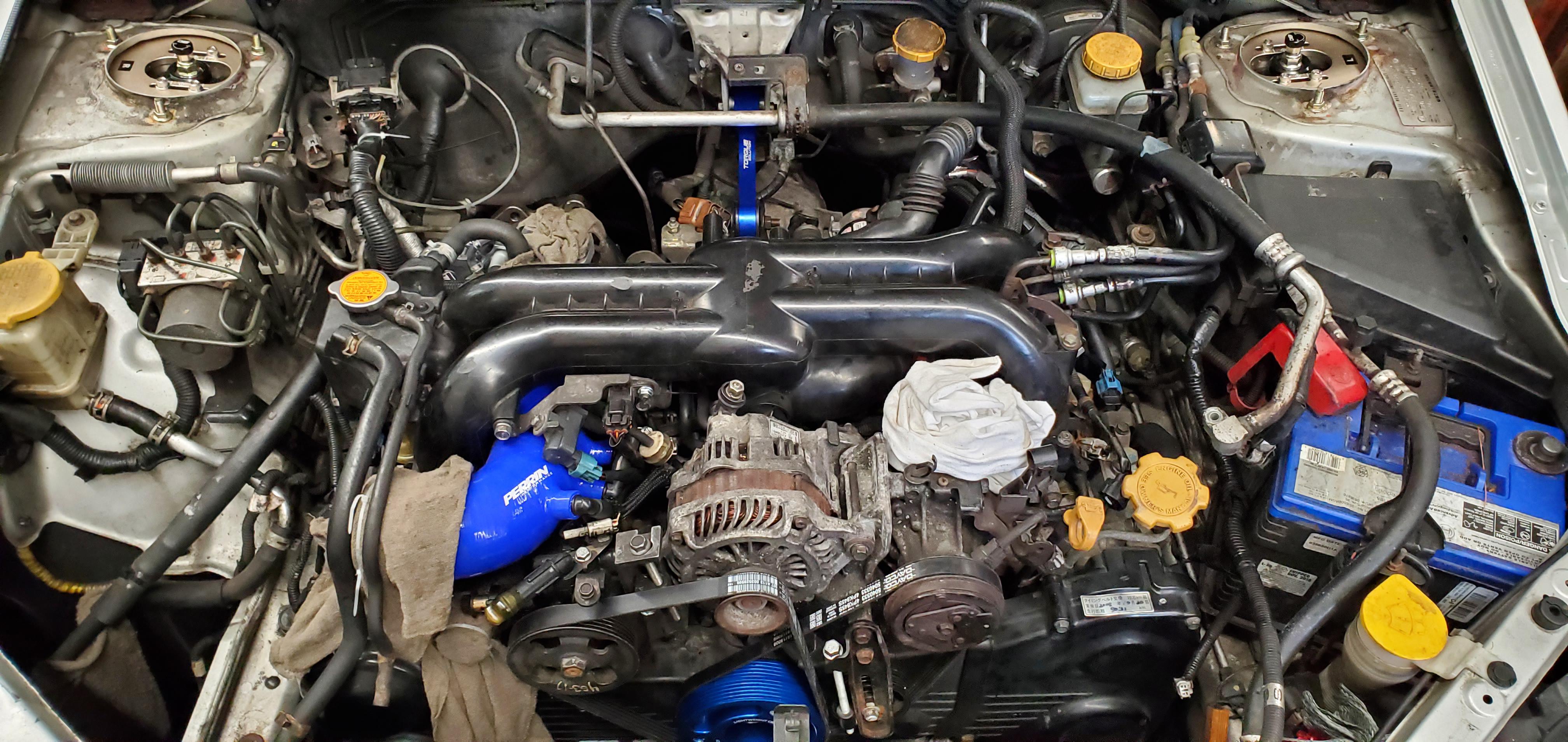The EJ30Y is offically in the car, mounts and bell housing bolts are tightened r/subaru