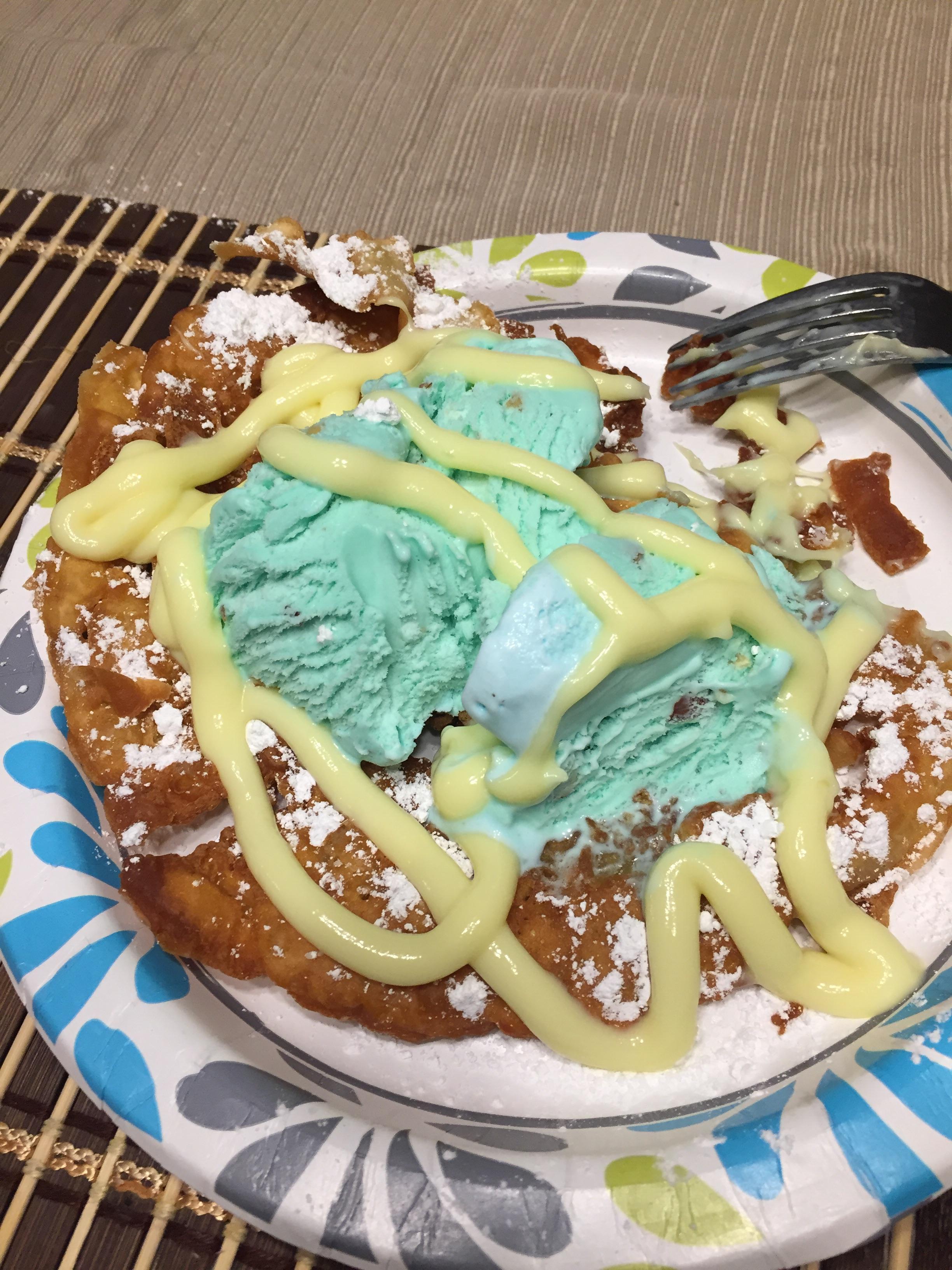 [homemade] Funnel cake with pistachio ice cream and Bavarian cream r/food