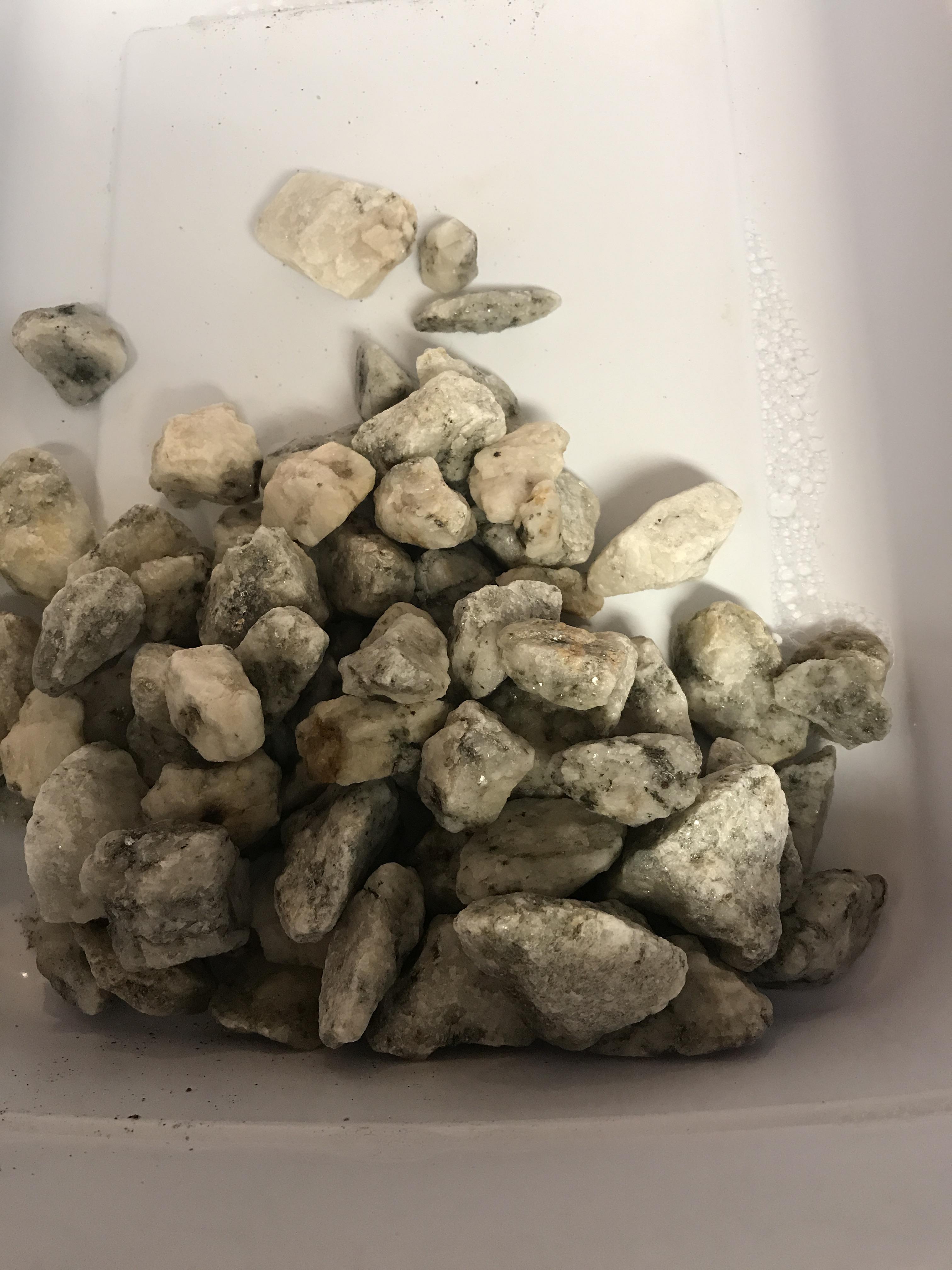 Anyone know what this is? Came with bulk rocks from hiddenite, NC r/Rocks