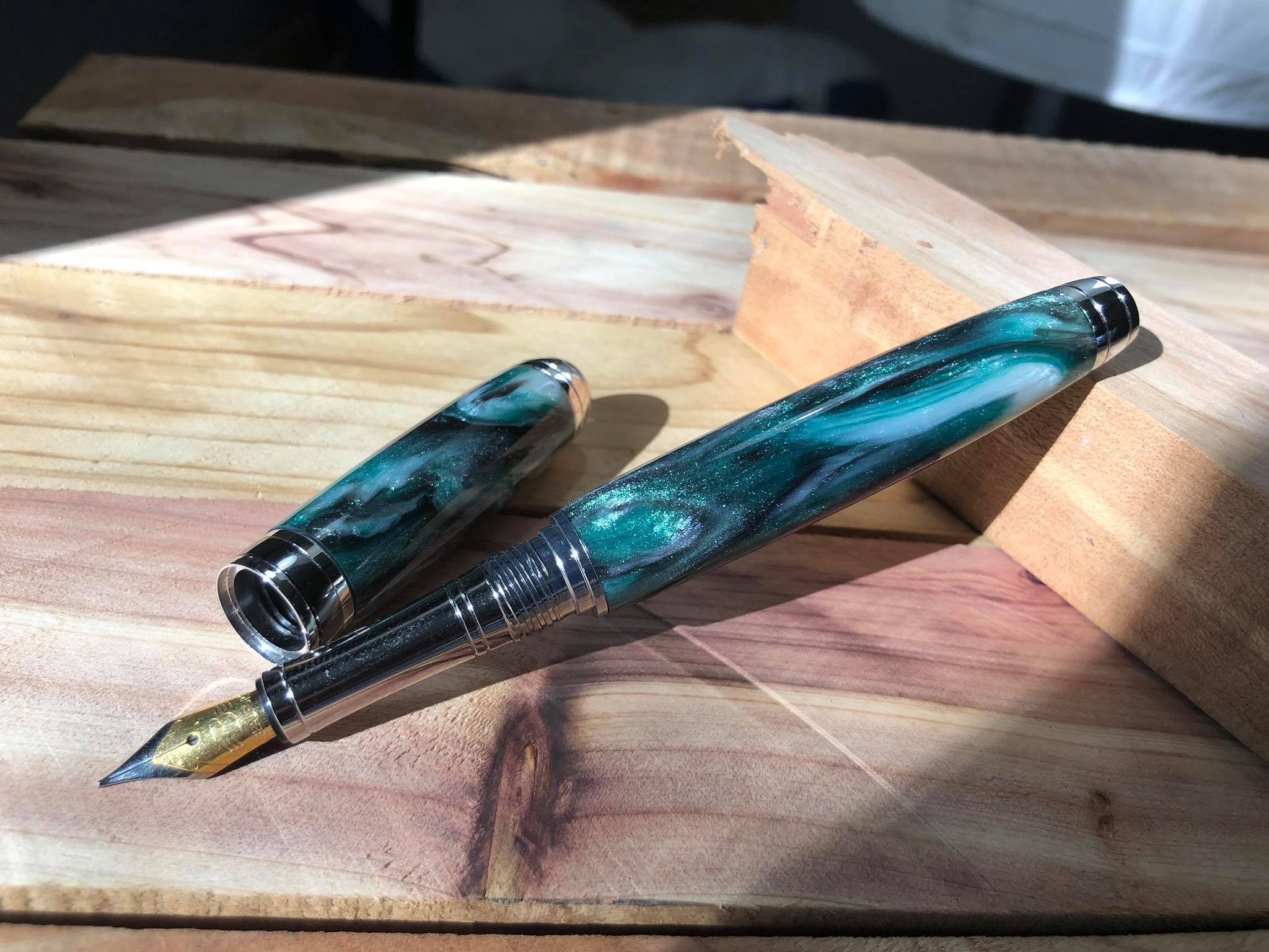 The beautiful Slytherin themed fountain pen my husband made for me