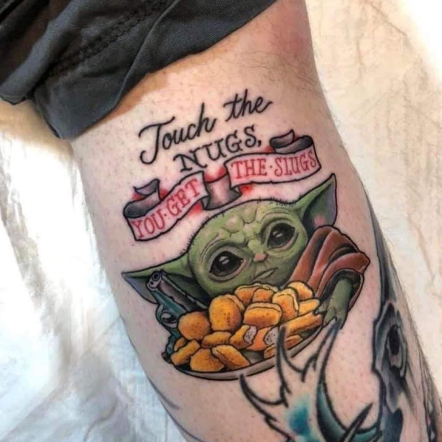 Tattoo of Baby Yoda protecting his chicken nuggets BabyYoda