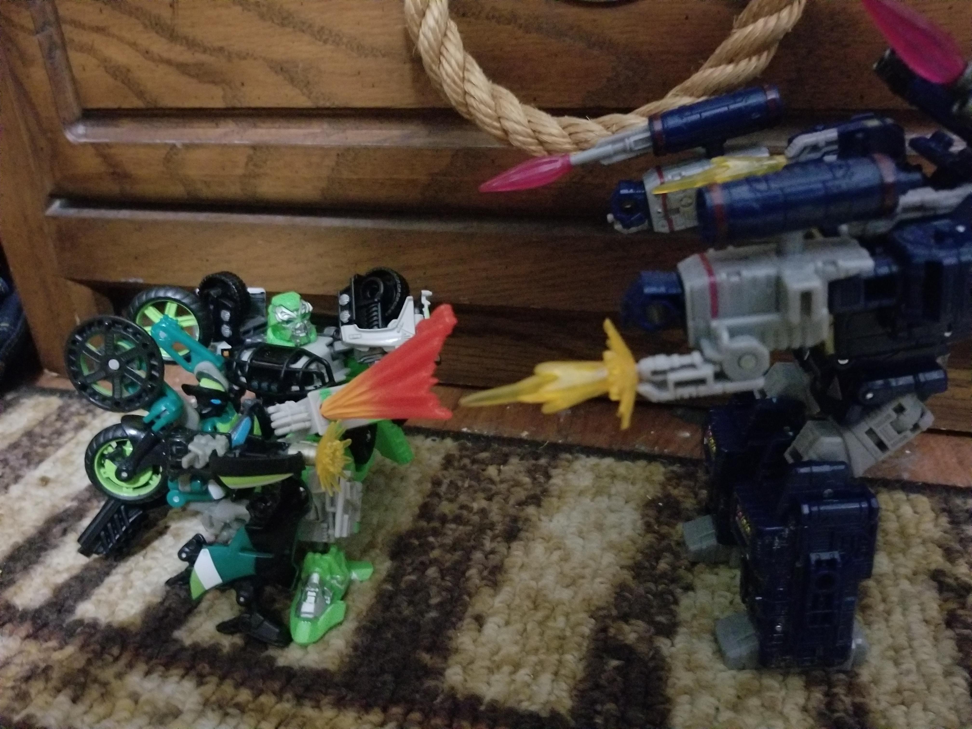 Ratchet and Knockout vs Soundwave (Not the best battle image but I