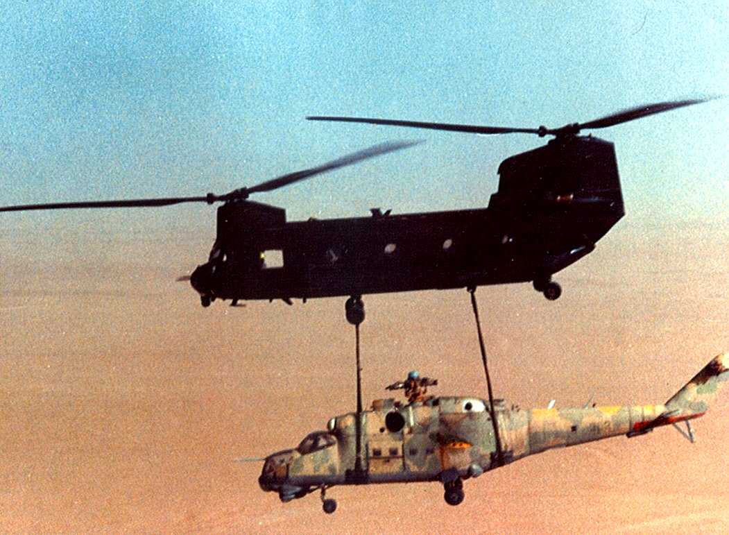 CH47 Chinook carrying an Mi24 Hind r/Helicopters