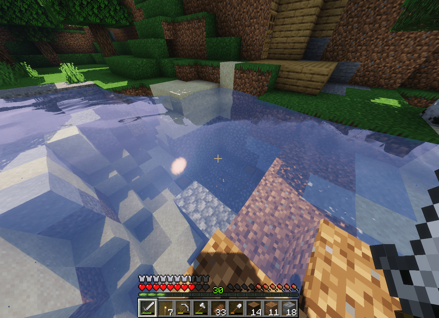 A zombie spawner underwater that i found next to my base and there is water inside because it's
