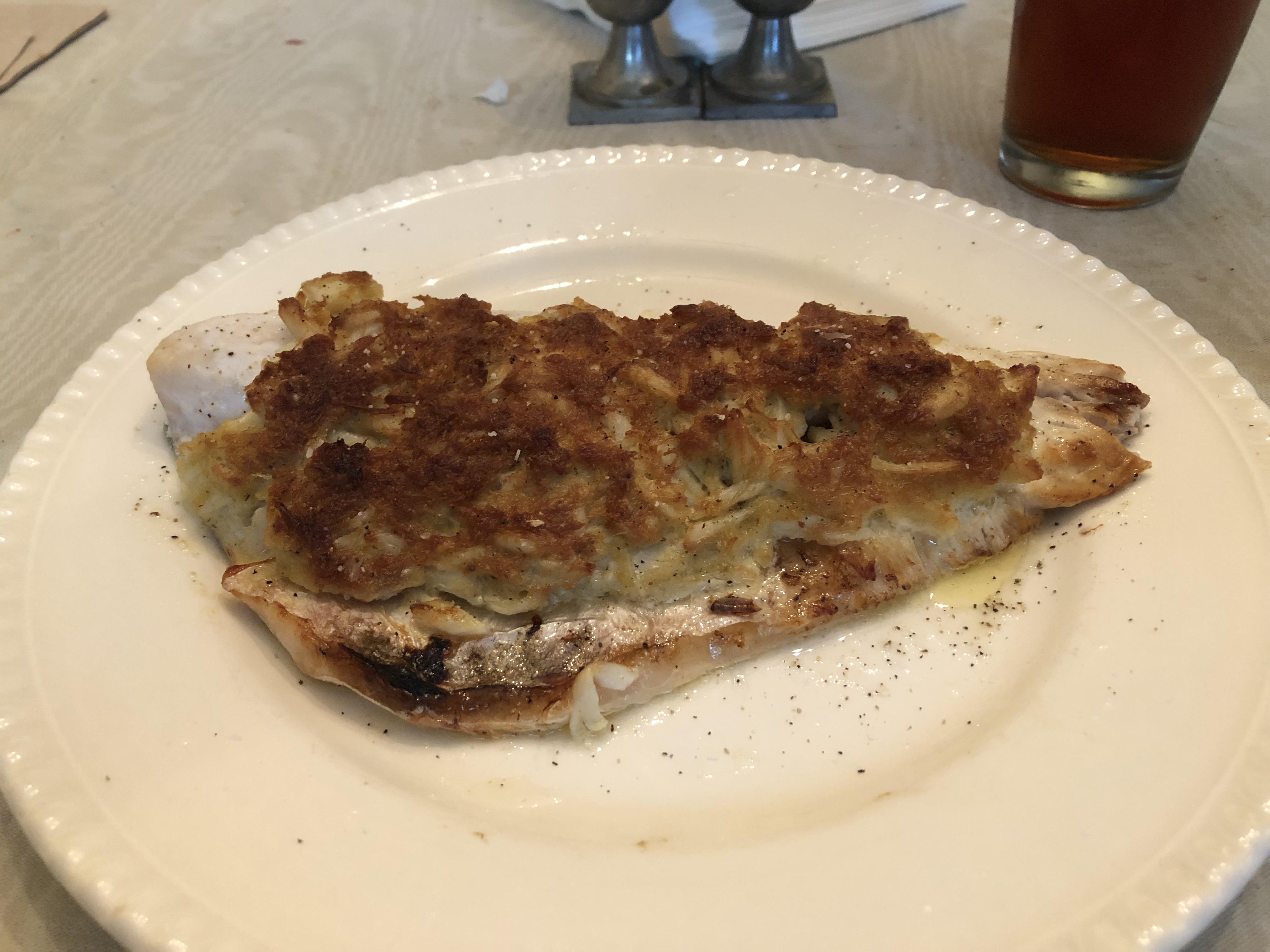 Stuffed rockfish fillet broiled in a Lodge. r/castiron