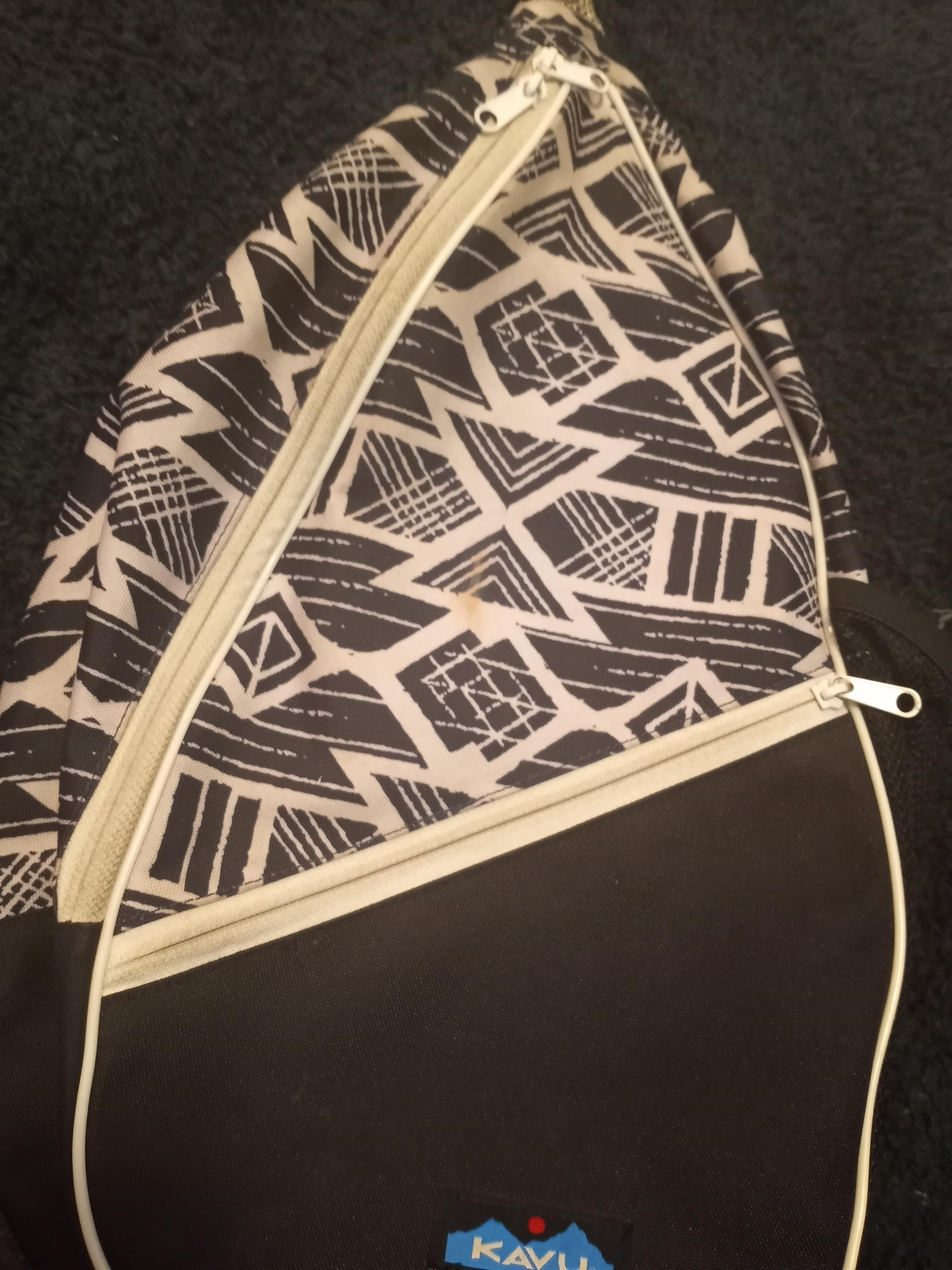 Tips for cleaning spilled foundation on a Kavu Paxton bag/brightening