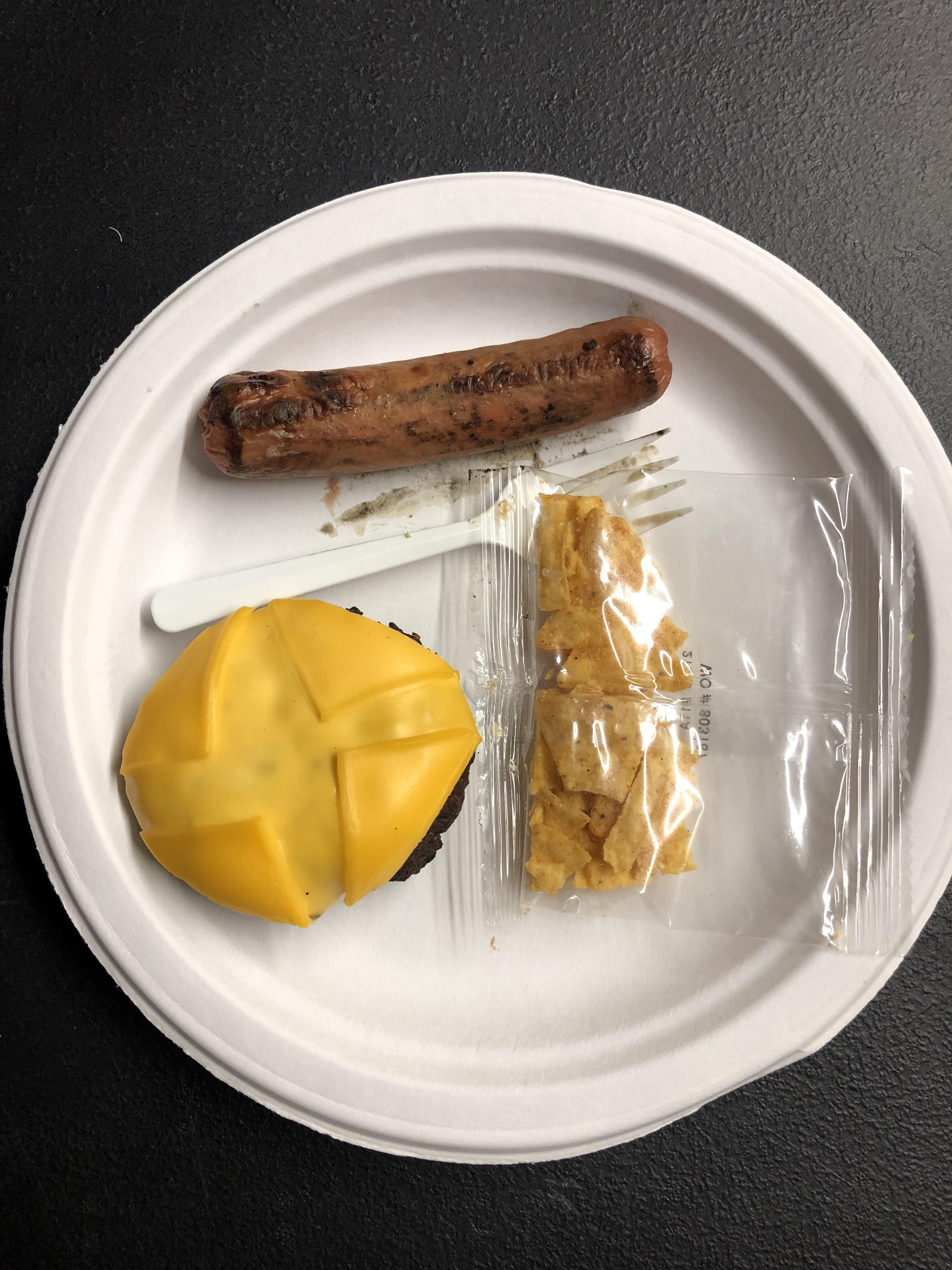 Company Christmas dinner, hot dog, beef patty w/cheese, bag of chips