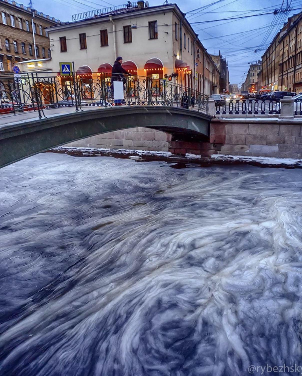 Frozen water patterns in this river in Russia interestingasfuck